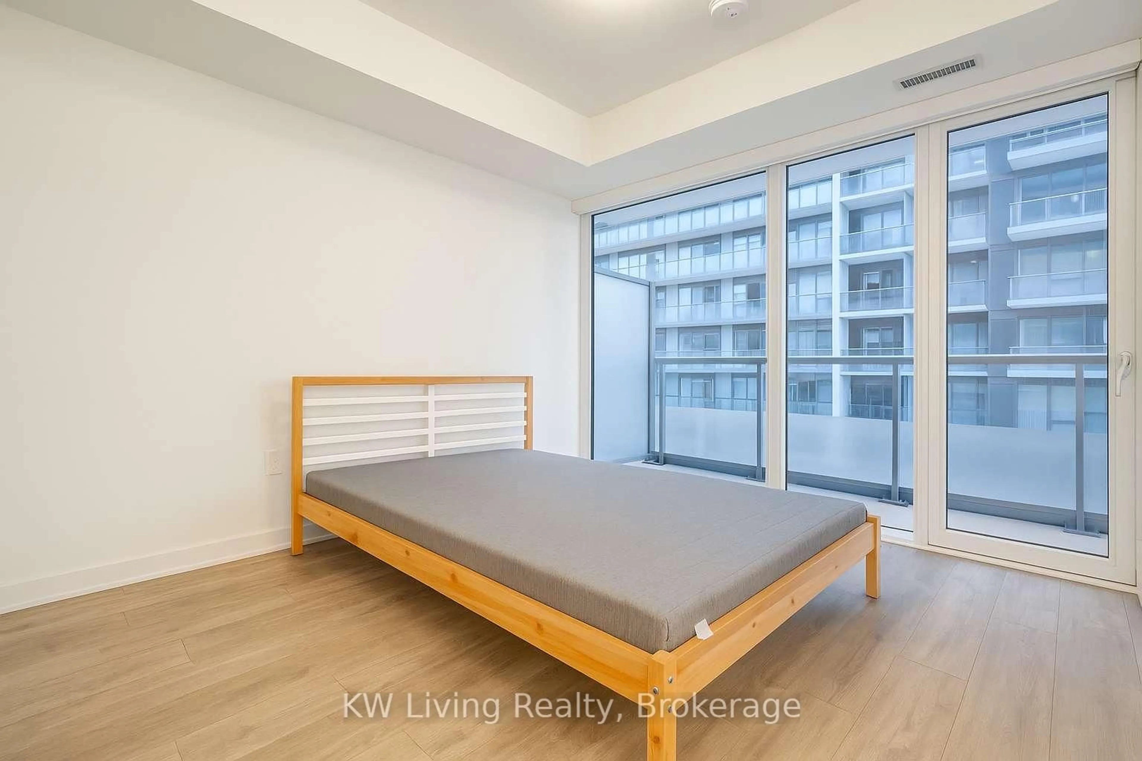 Bedroom with bed, wood/laminate floor for 70 Princess St #2010, Toronto Ontario M5A 0X6