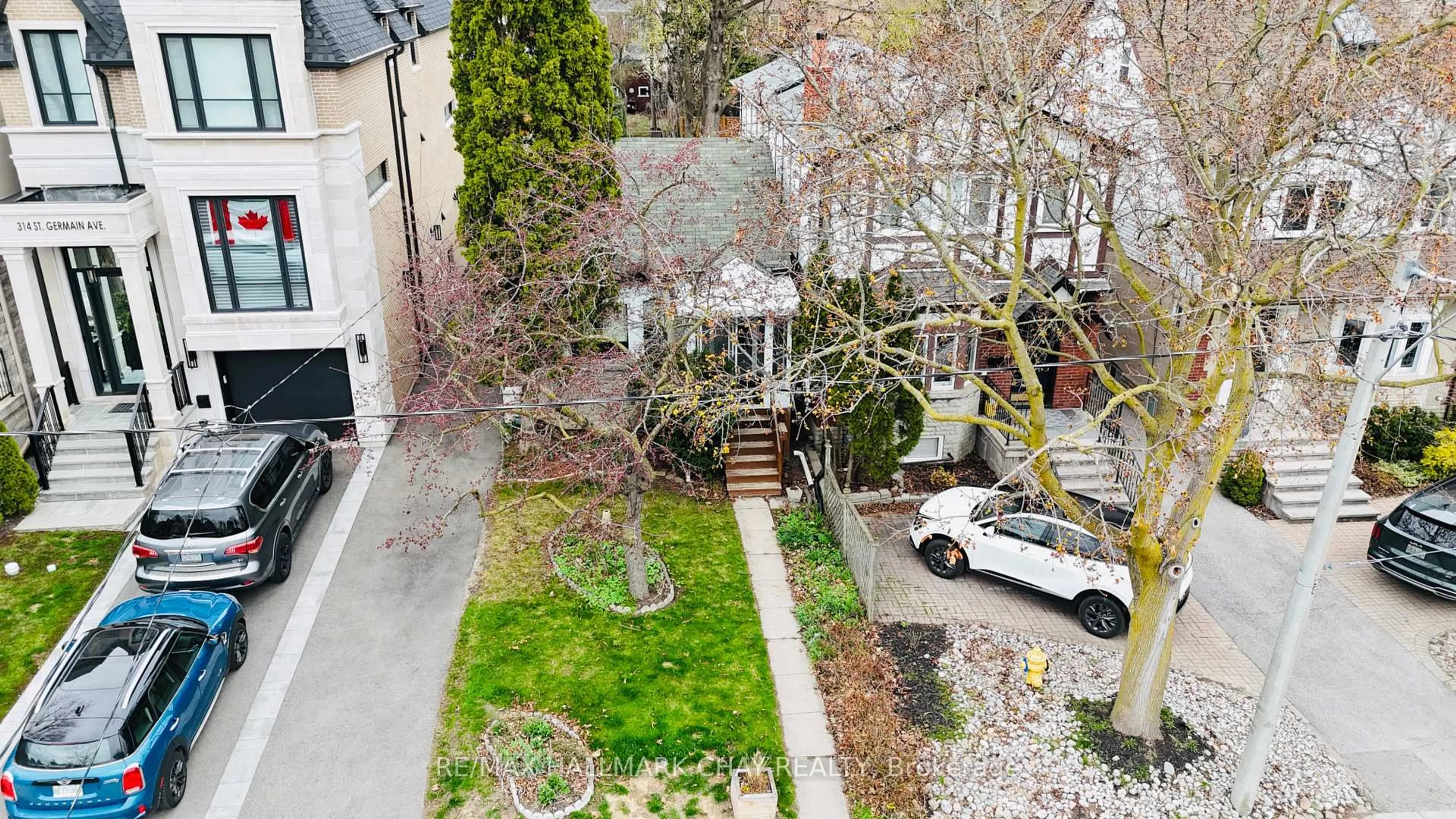 A pic from outside/outdoor area/front of a property/back of a property/a pic from drone, street for 310 St Germain Ave, Toronto Ontario M5M 1W3