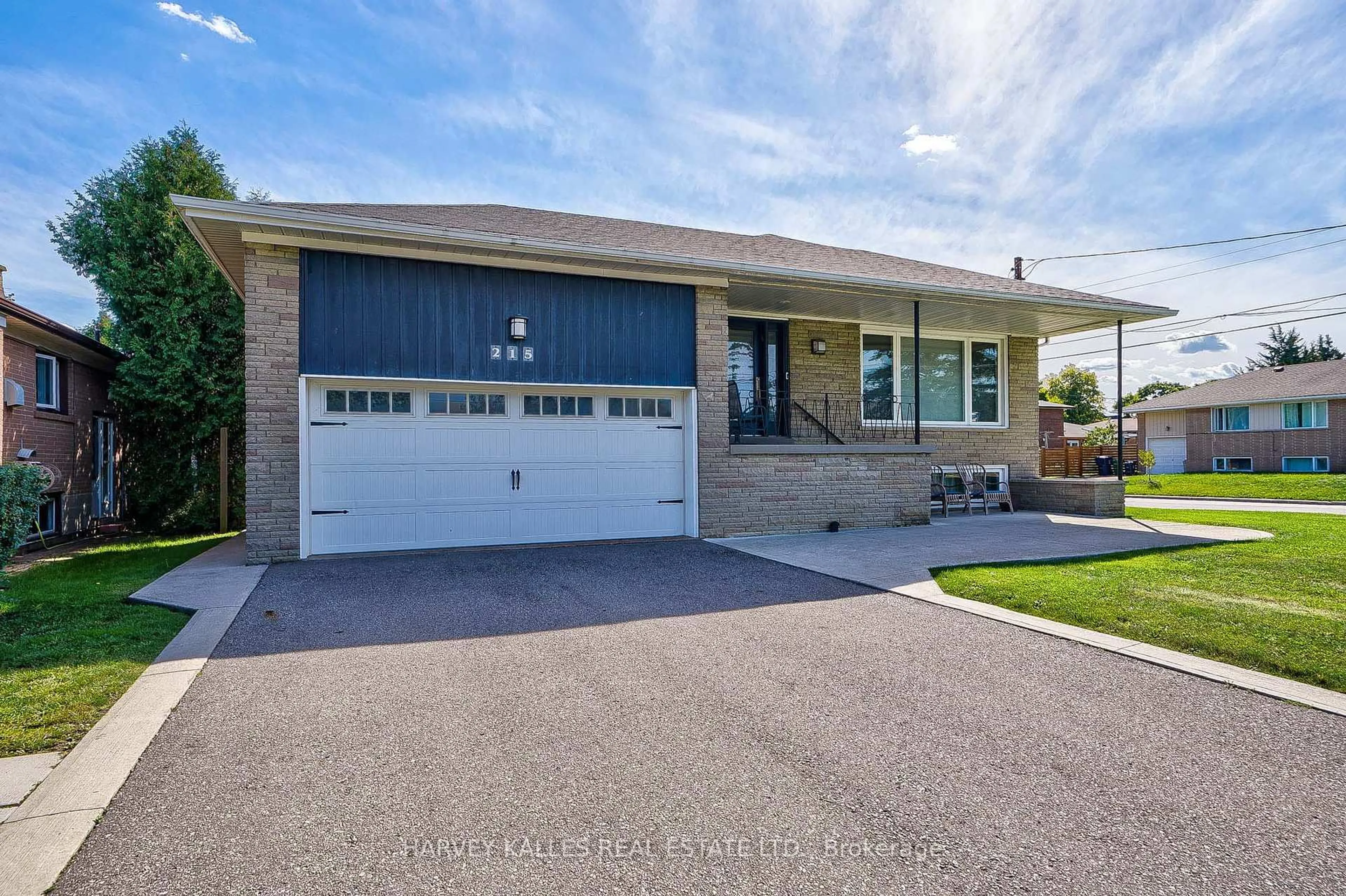 Home with vinyl exterior material, street for 215 Searle Ave, Toronto Ontario M3H 4B6