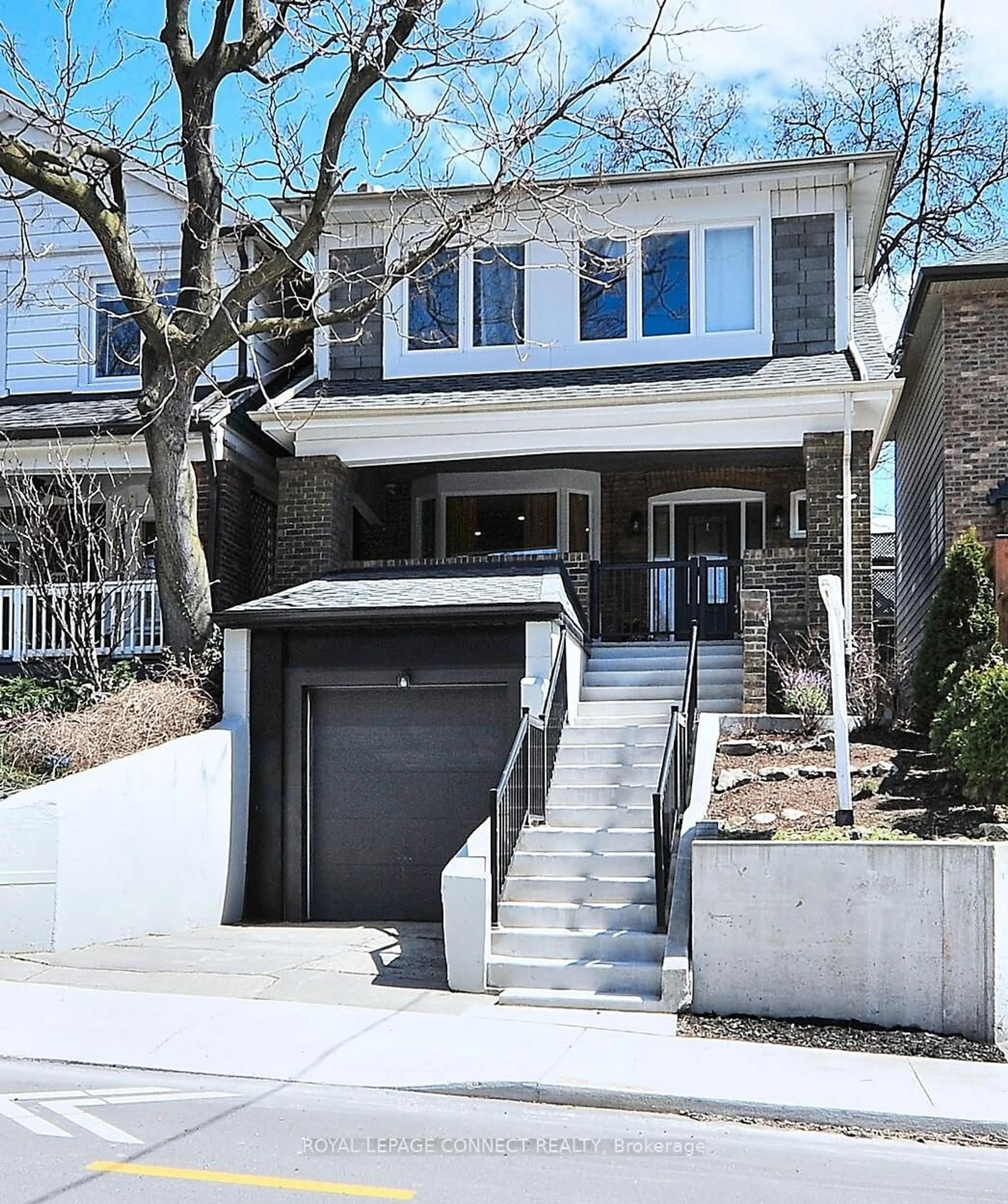 Home with brick exterior material, street for 217 Winona Dr, Toronto Ontario M6C 3S4