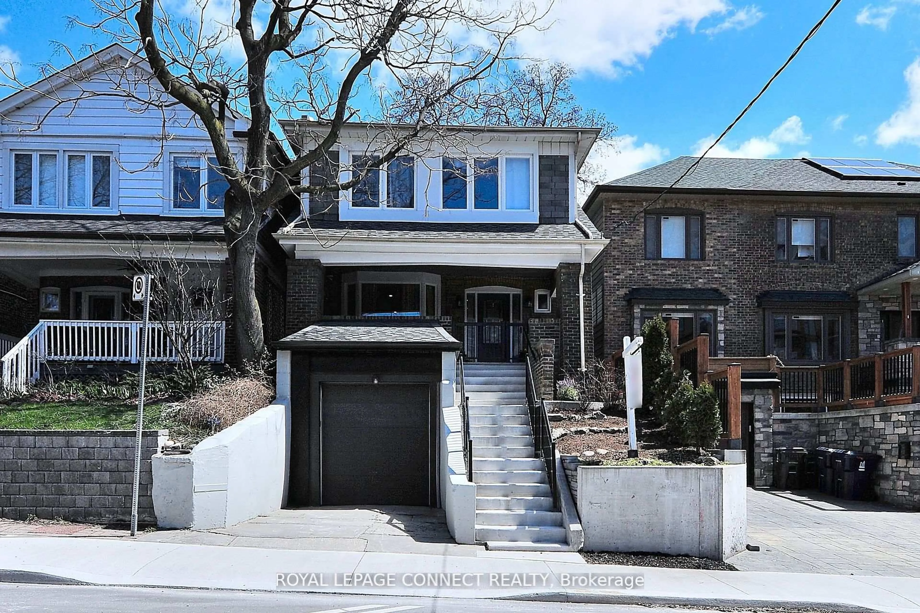 Home with brick exterior material, street for 217 Winona Dr, Toronto Ontario M6C 3S4