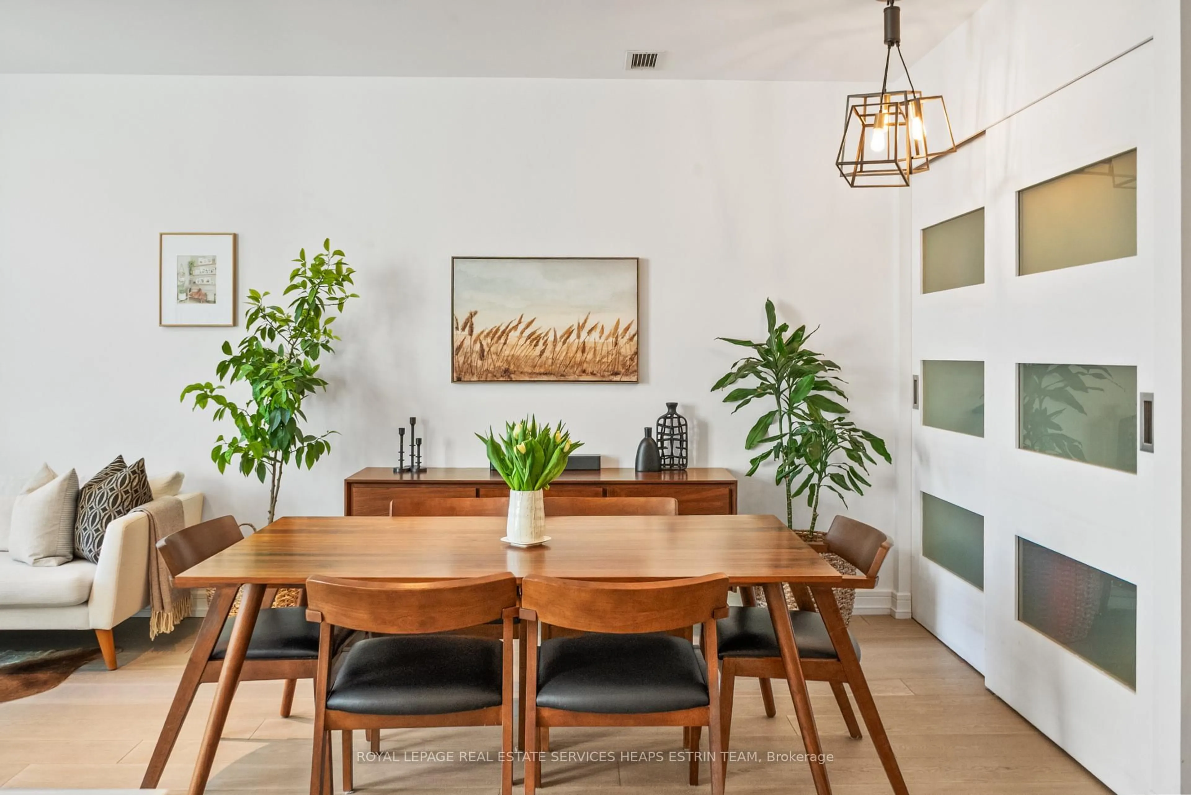 Dining room, wood/laminate floor for 35 Brian Peck Cres #TH112, Toronto Ontario M4G 0A5