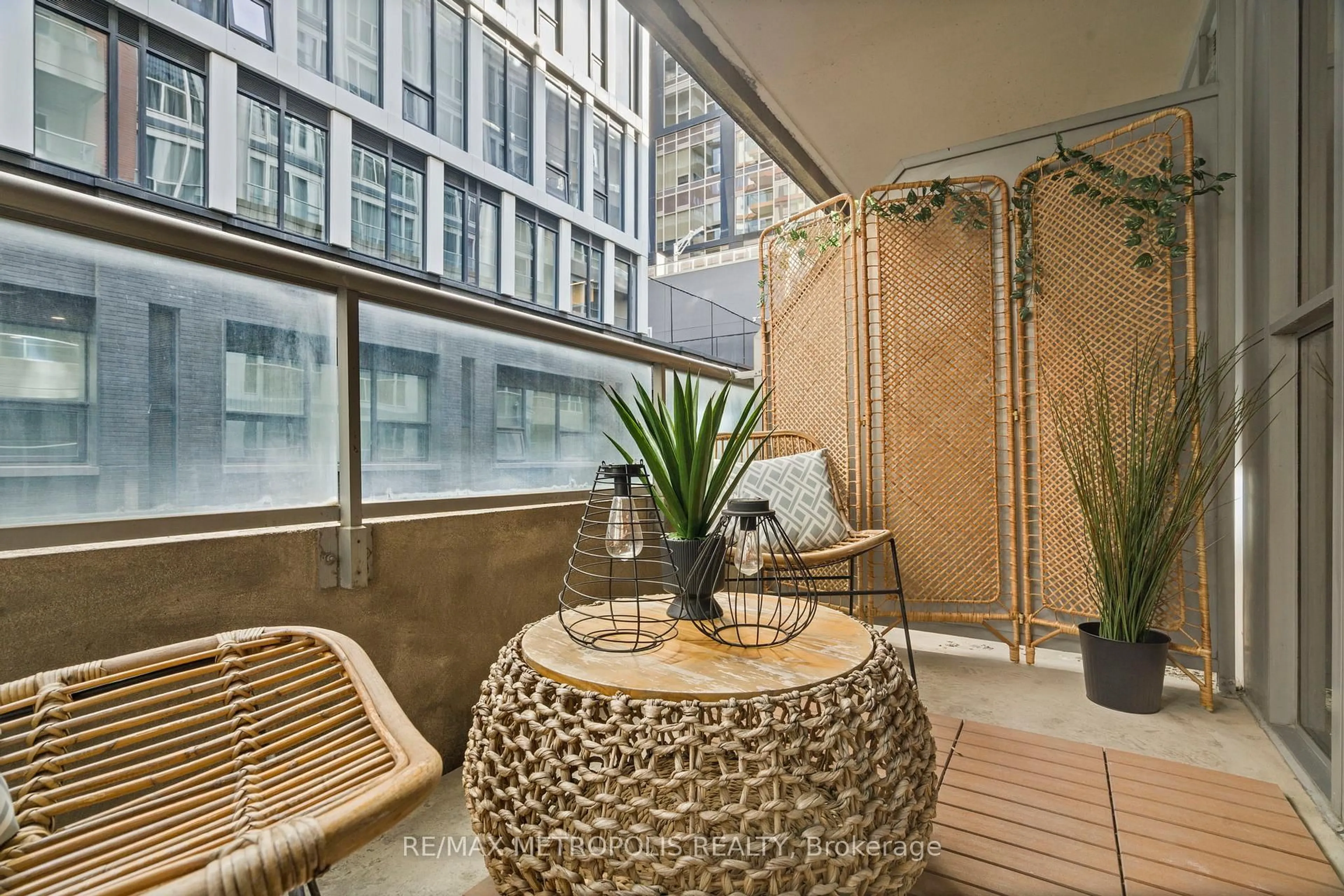 Patio, city buildings view from balcony for 270 WELLINGTON St #623, Toronto Ontario M5V 3P5