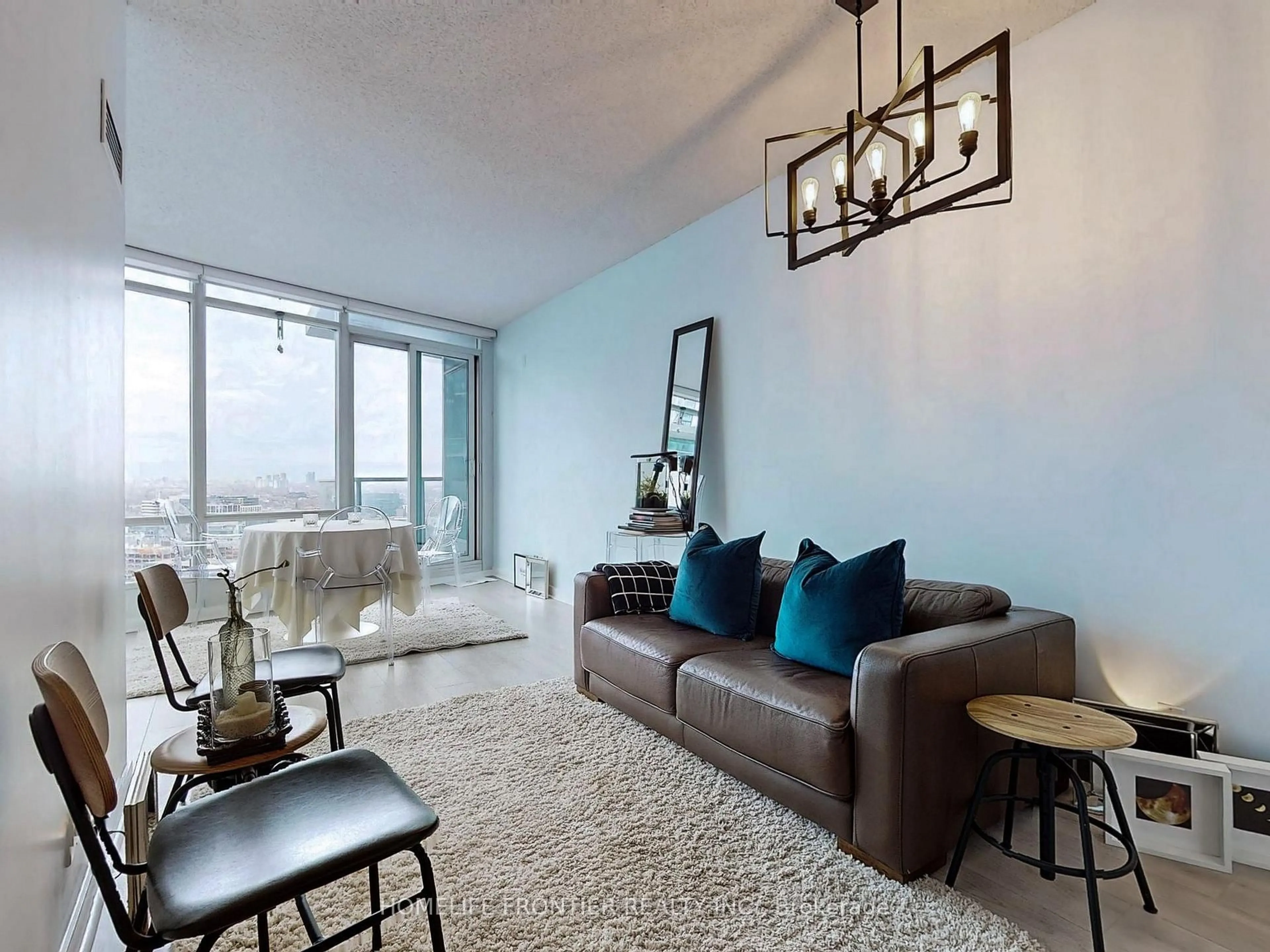 Living room with furniture, unknown for 373 Front St #3202, Toronto Ontario M5V 3R7