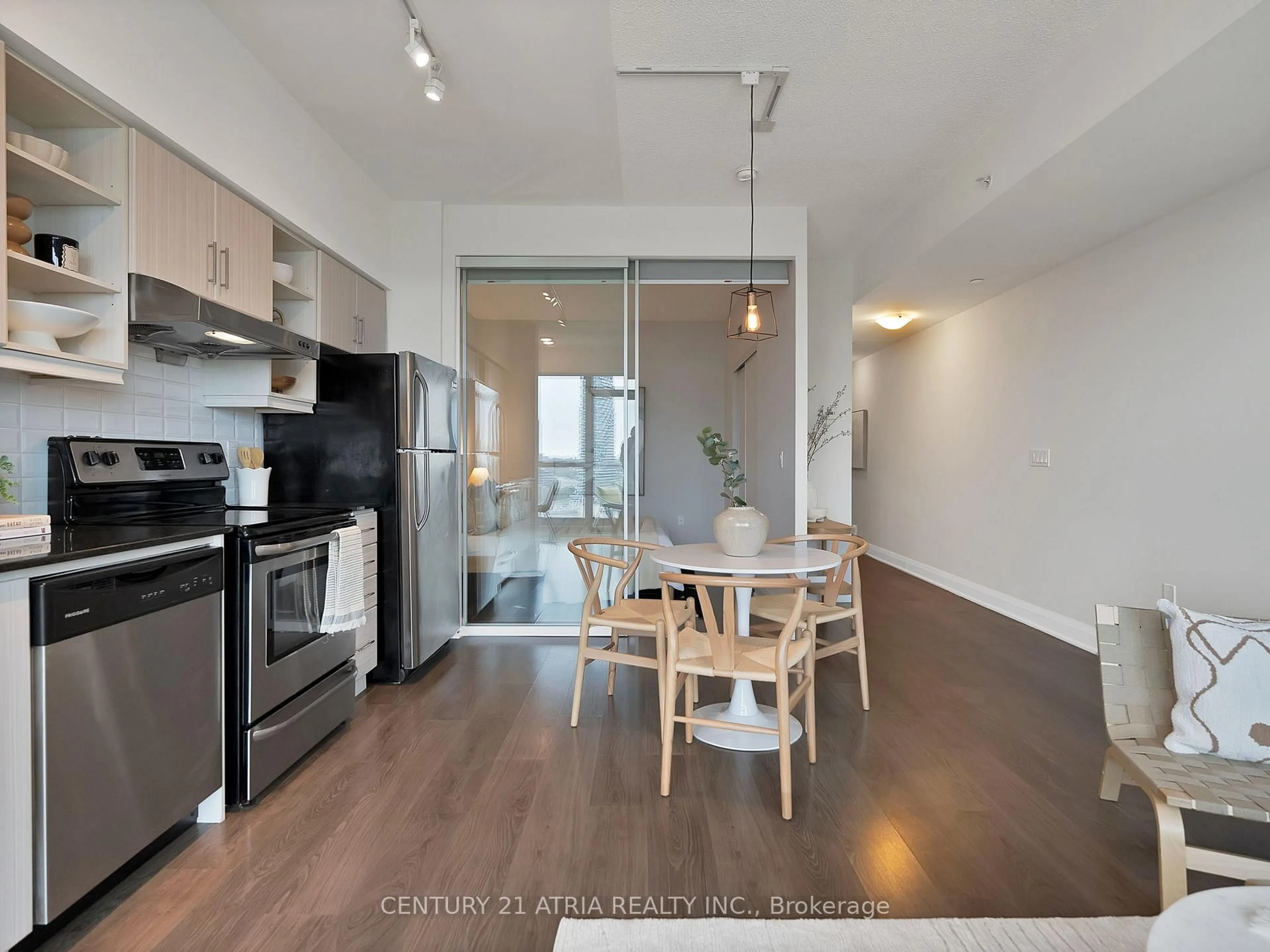 Open concept kitchen, wood/laminate floor for 160 Vanerhoof Ave #LPH18, Toronto Ontario M4G 0B7
