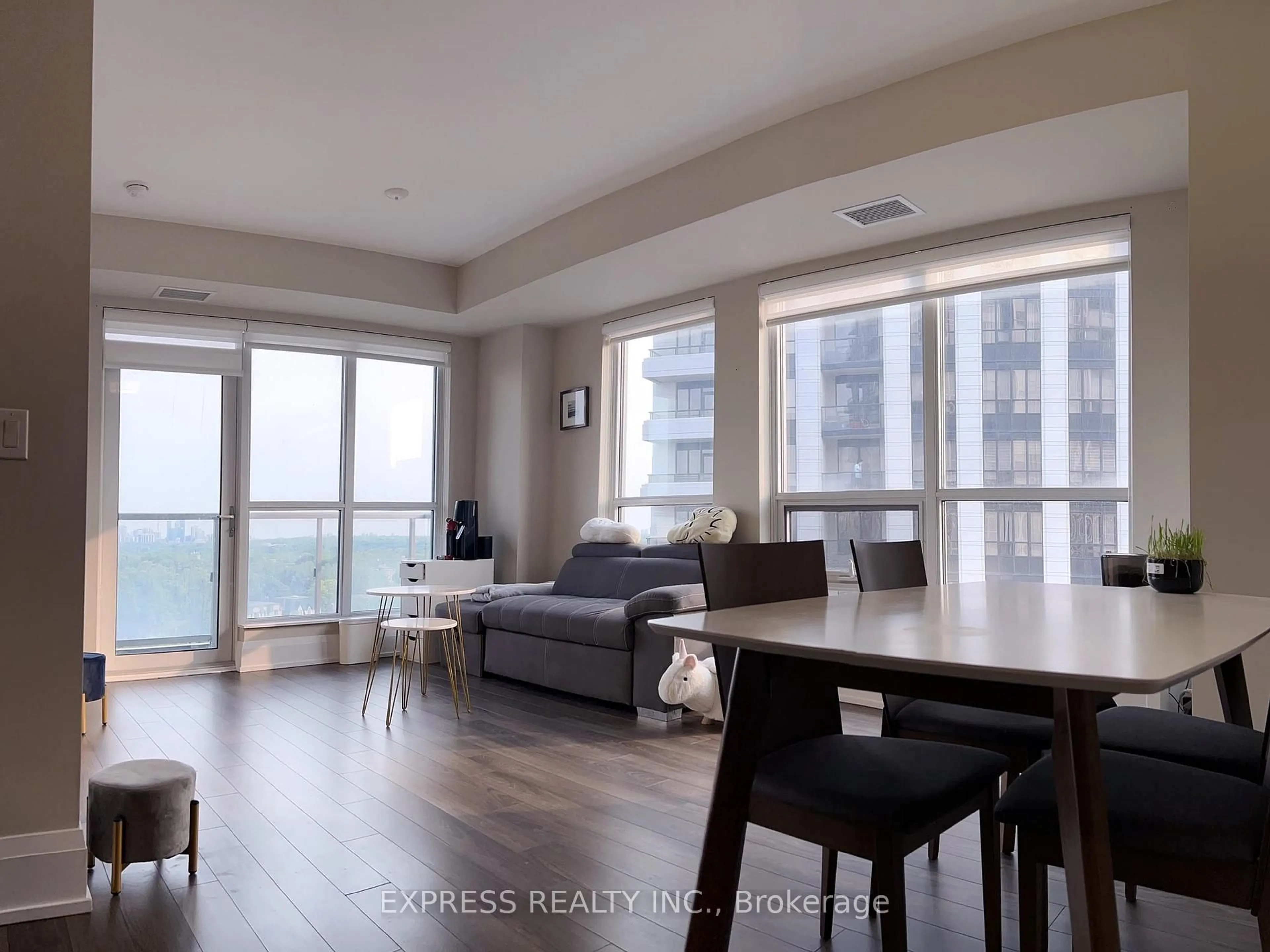 Living room with furniture, wood/laminate floor for 120 Harrison Garden Blvd #1309, Toronto Ontario M2N 0H1