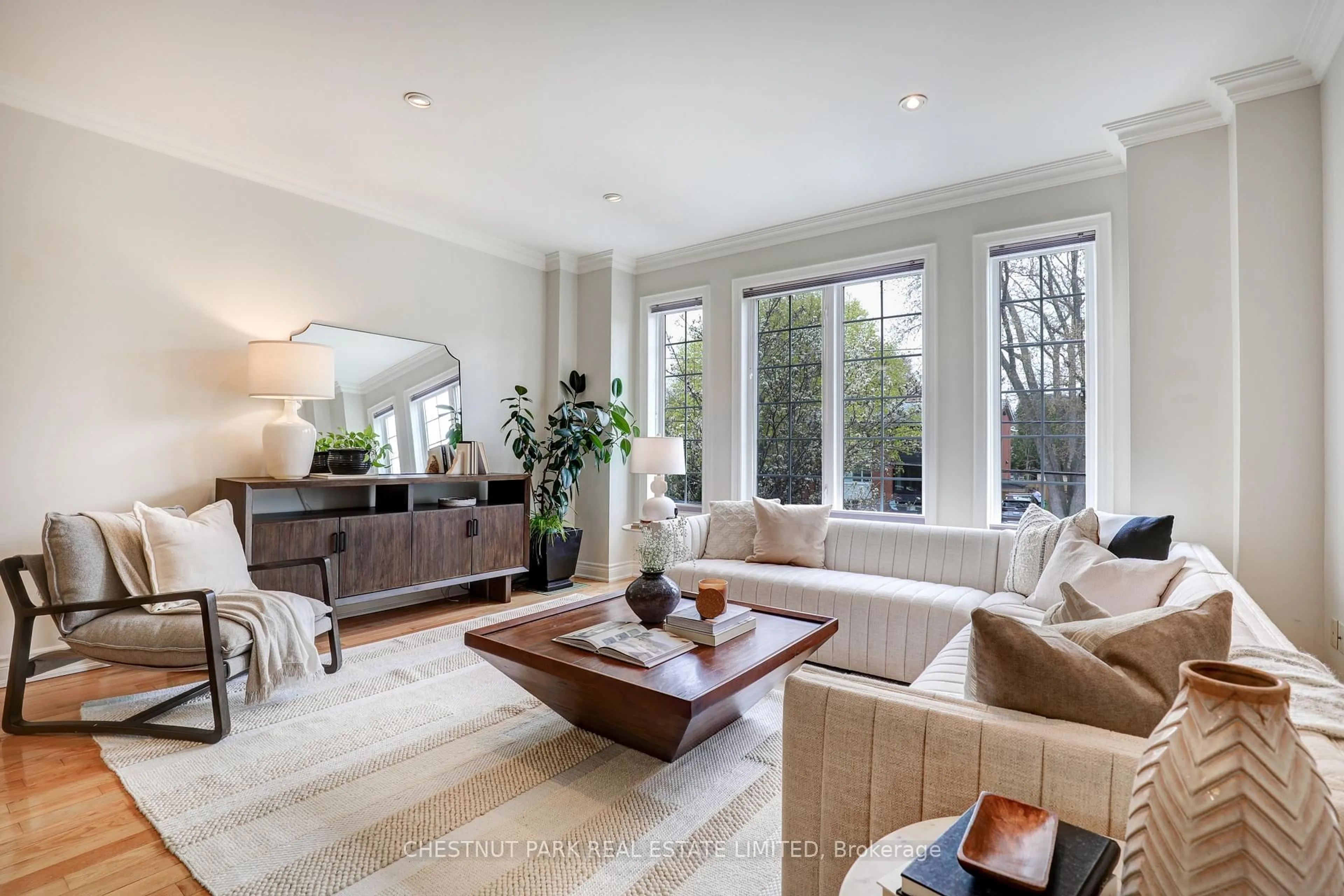 Living room with furniture, unknown for 127 Barber Greene Rd, Toronto Ontario M3C 3Y5