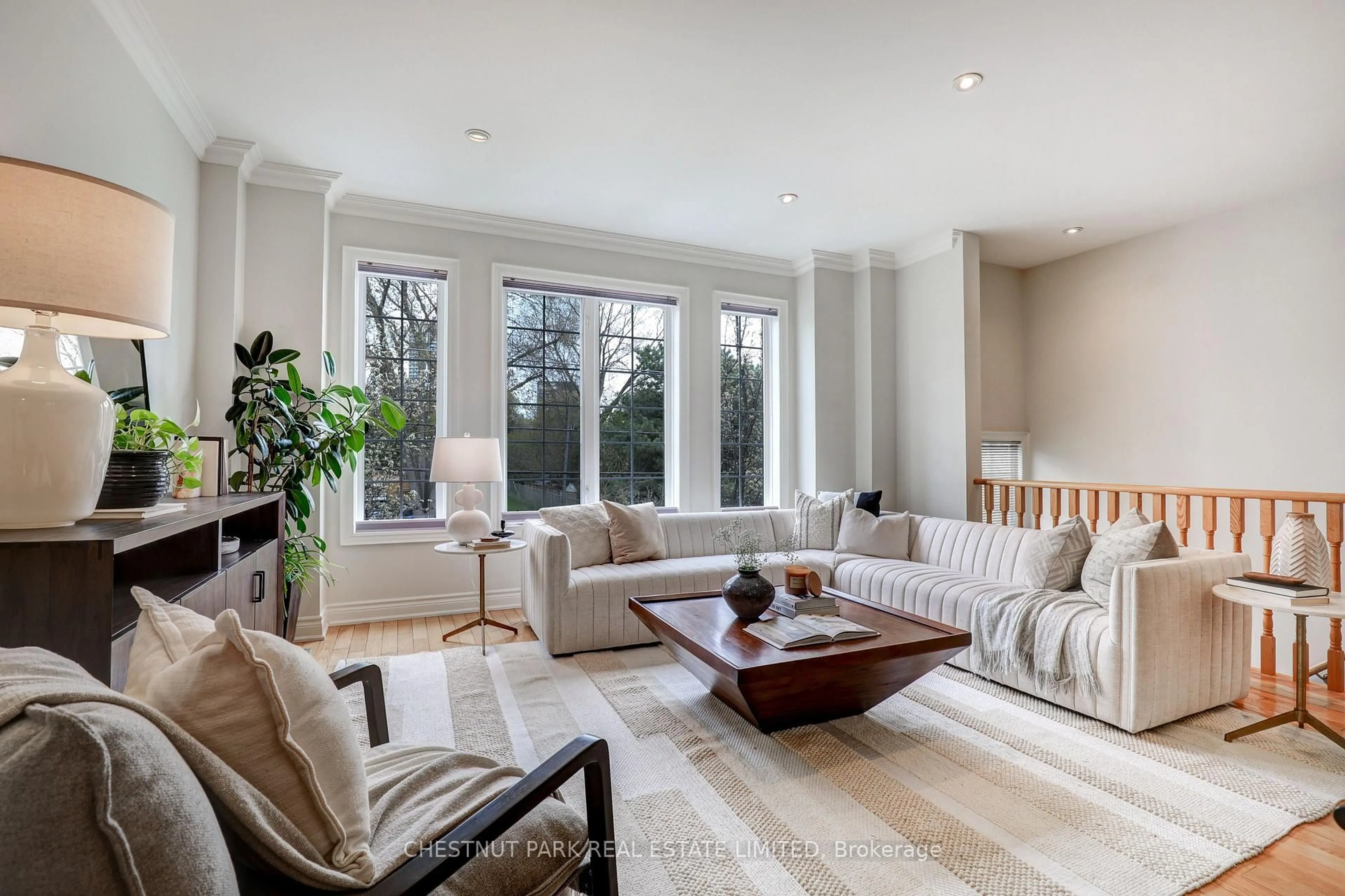 Living room with furniture, unknown for 127 Barber Greene Rd, Toronto Ontario M3C 3Y5