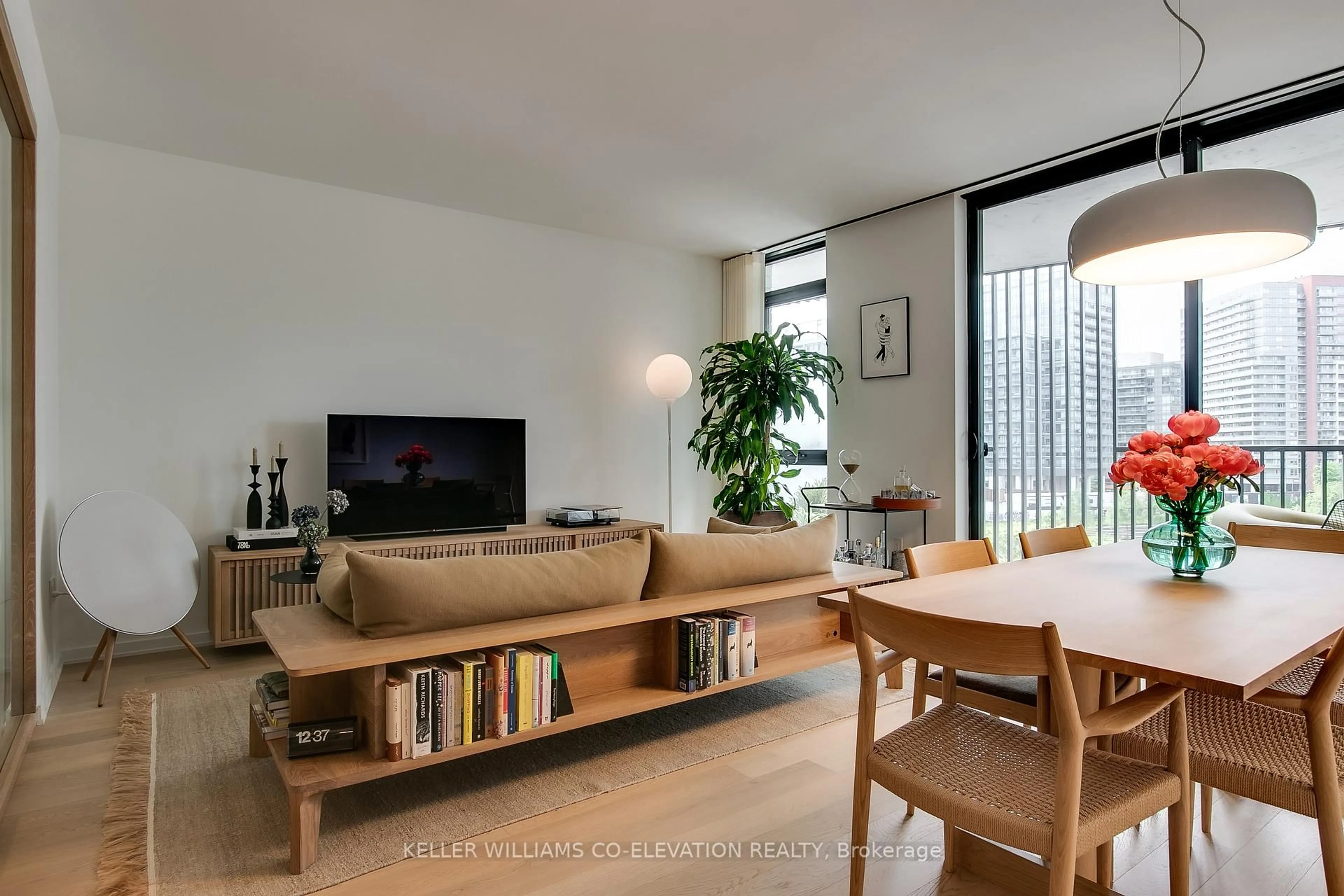 Living room with furniture, wood/laminate floor for 41 Dovercourt Rd #601, Toronto Ontario M6J 3C2