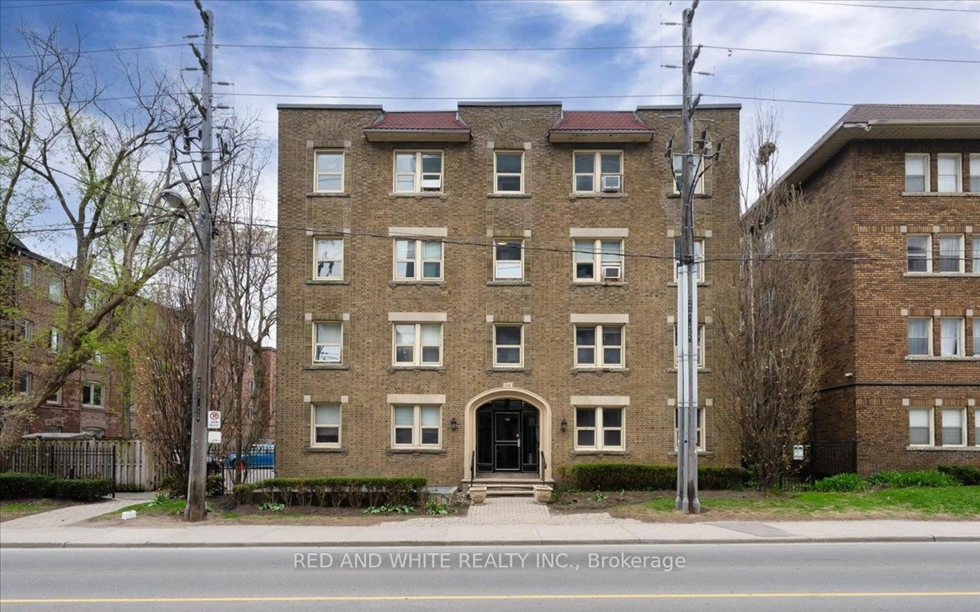 Home with brick exterior material, building for 114 Vaughan Rd #103, Toronto Ontario M6C 2M1