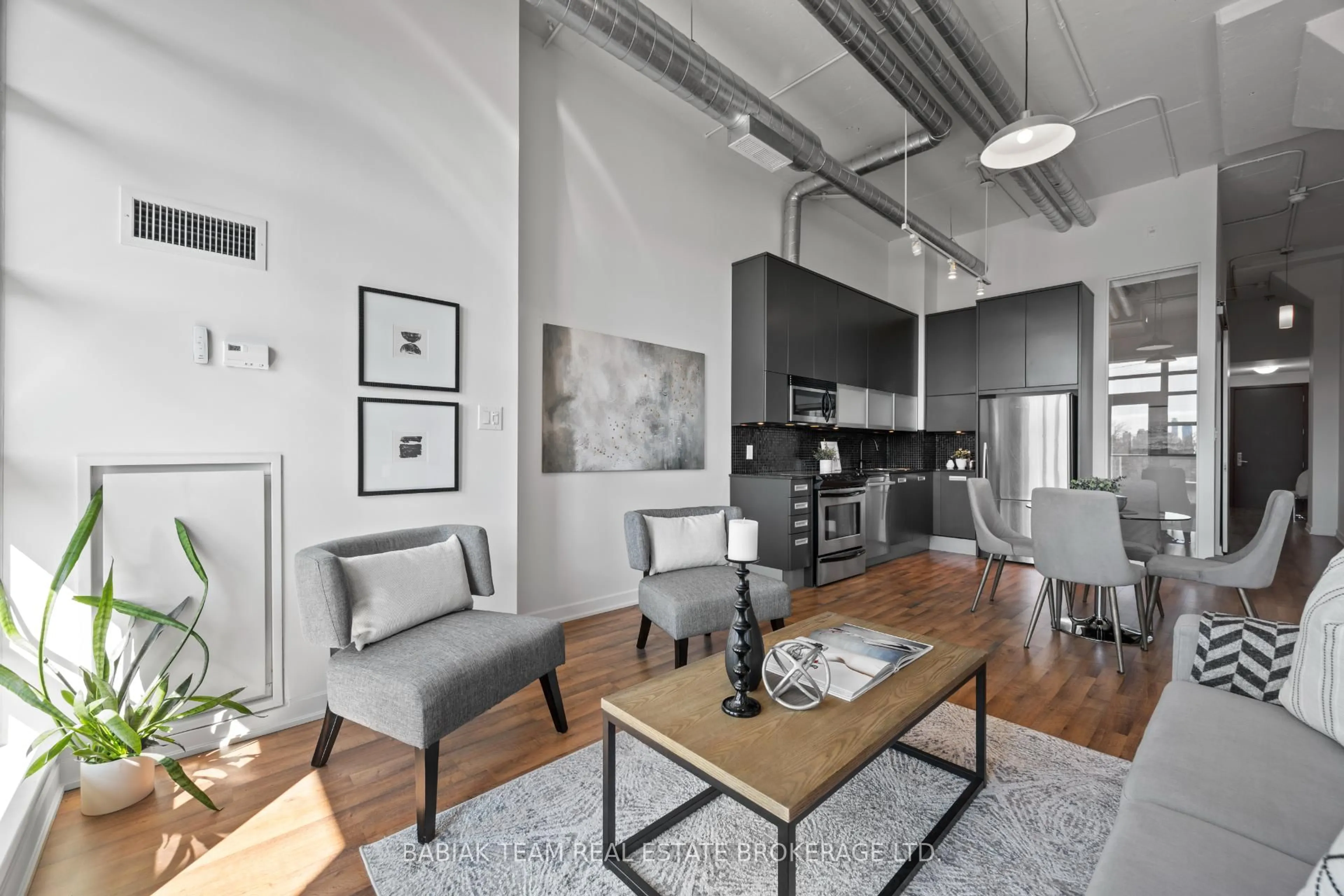 Living room with furniture, cement floor for 380 Macpherson Ave #340, Toronto Ontario M4V 3E3