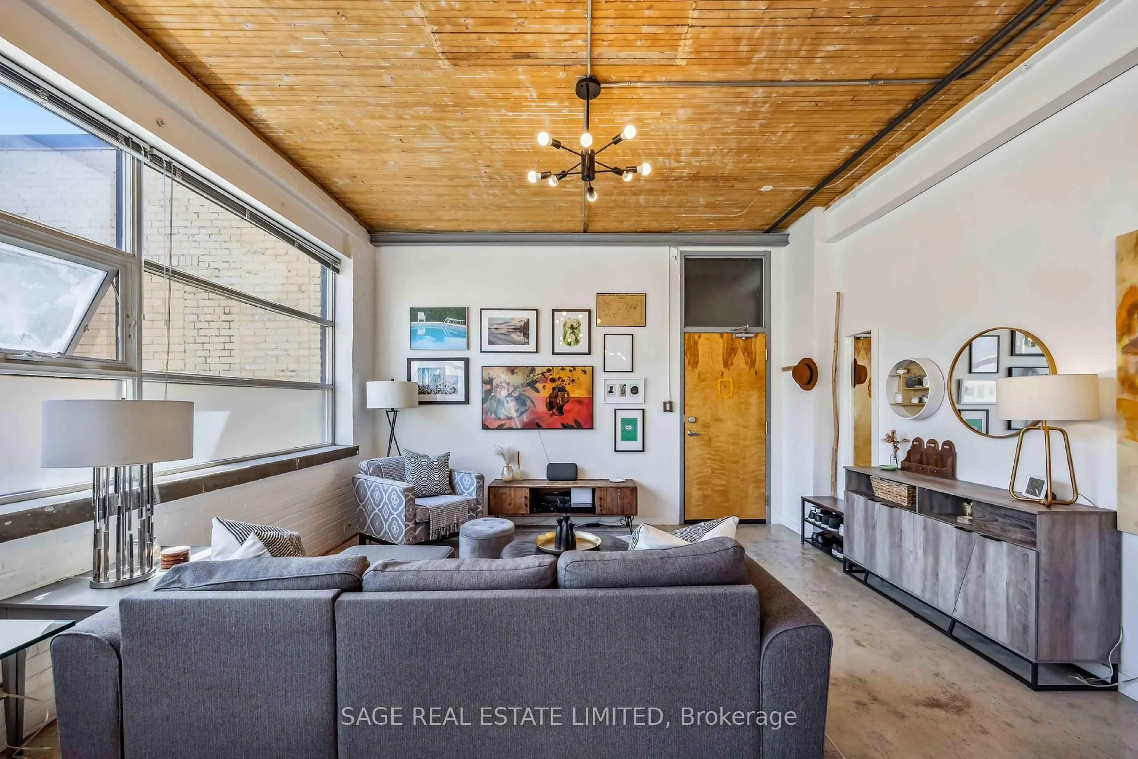 Living room with furniture, wood/laminate floor for 365 Dundas St #224, Toronto Ontario M5A 4R9
