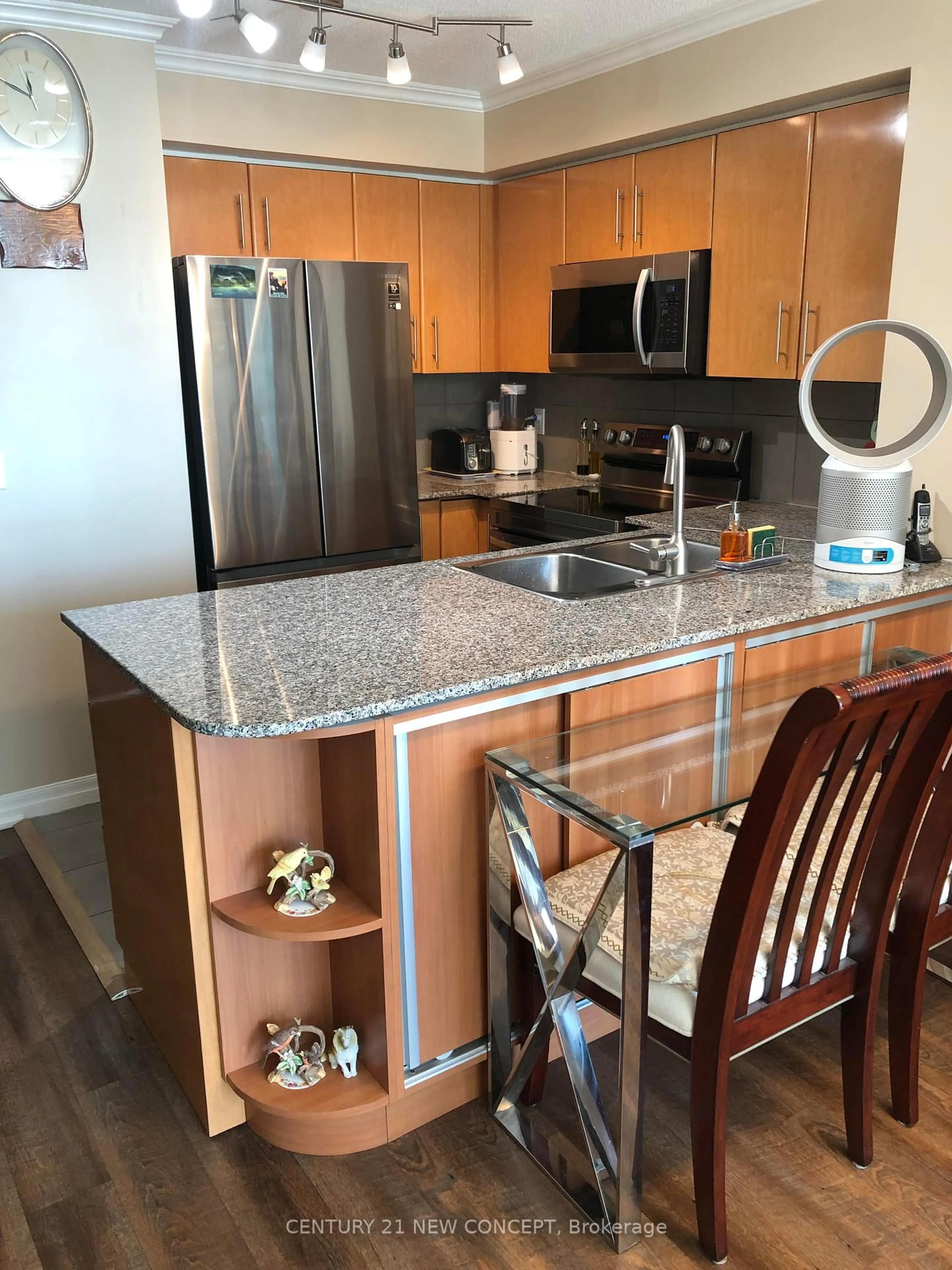 Open concept kitchen, wood/laminate floor for 16 Yonge St #1310, Toronto Ontario M5E 2A1