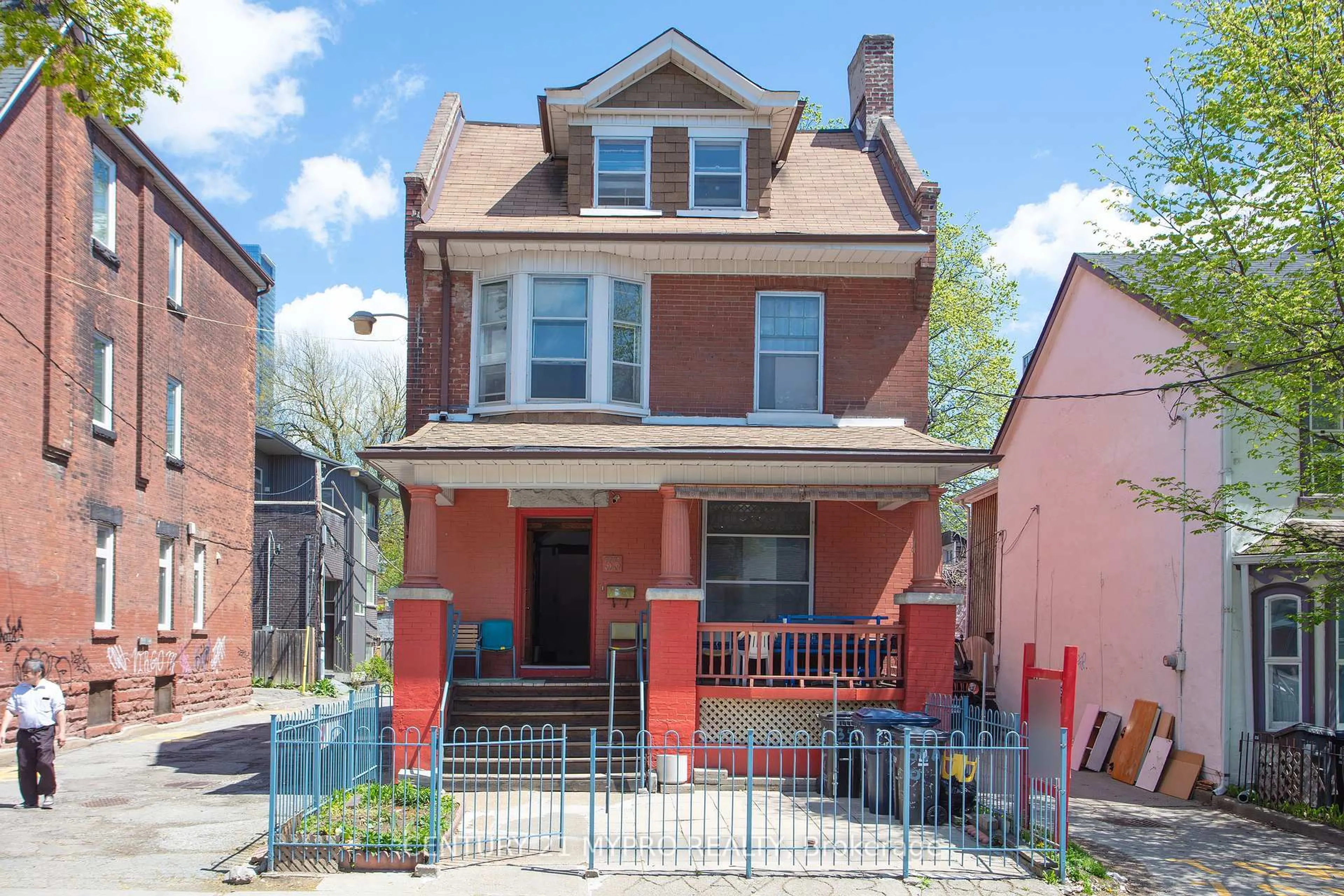 Home with brick exterior material, street for 35 Huron St, Toronto Ontario M5T 2A4