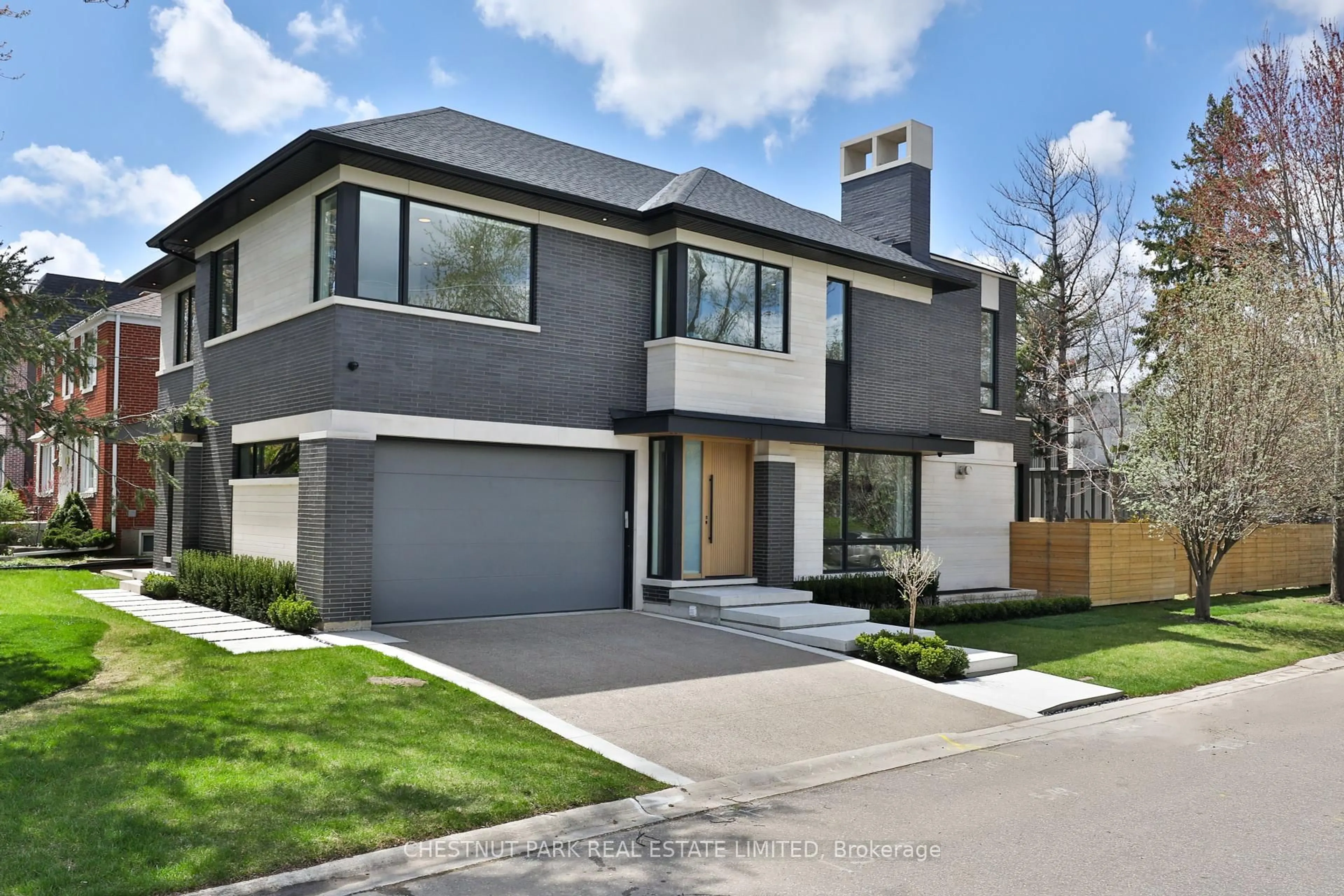 Home with brick exterior material, street for 2 Marchwood Dr, Toronto Ontario M3H 1J8