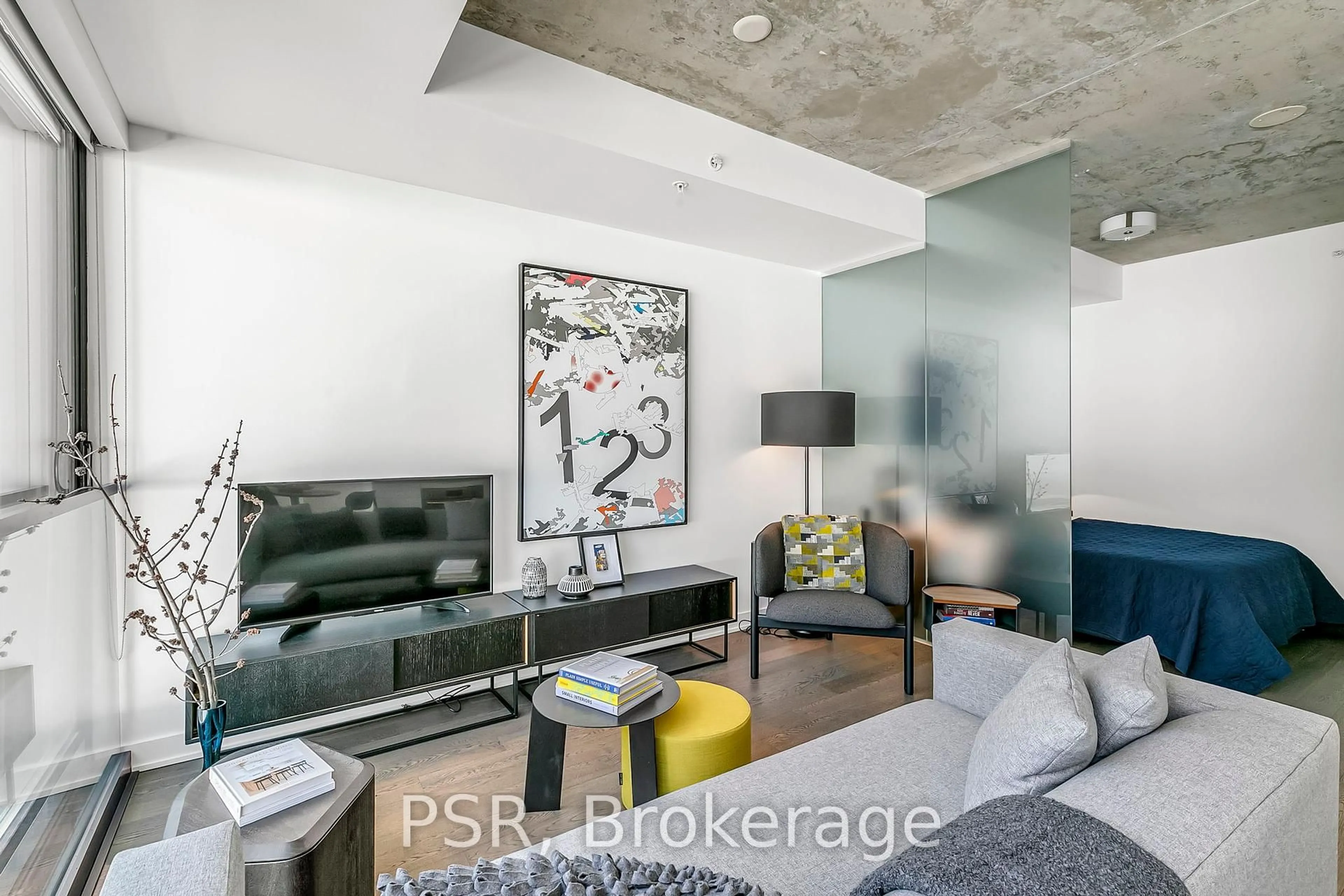 Living room with furniture, cement floor for 629 King St #620, Toronto Ontario M5V 1M5