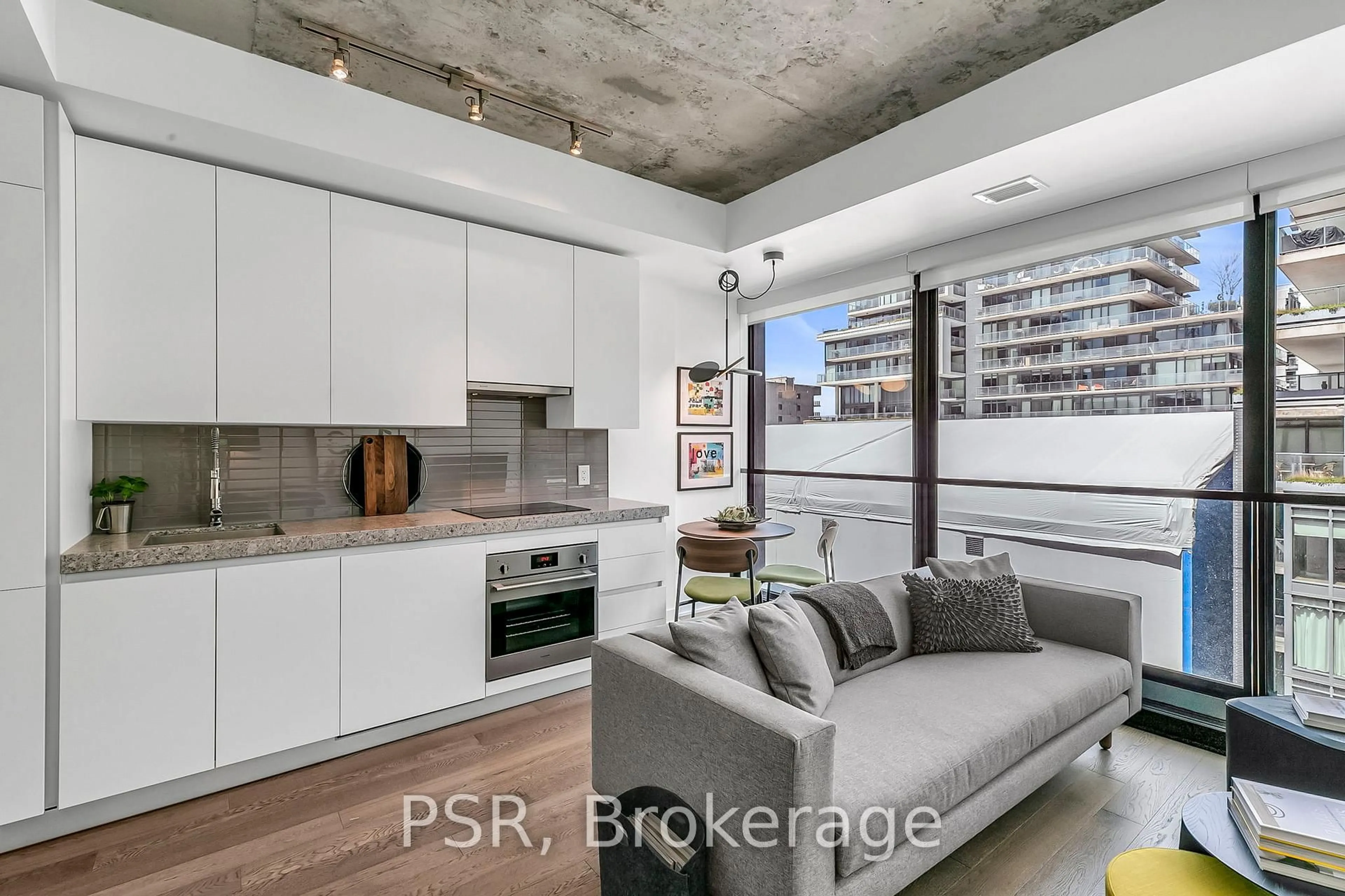 Open concept kitchen, cement floor for 629 King St #620, Toronto Ontario M5V 1M5