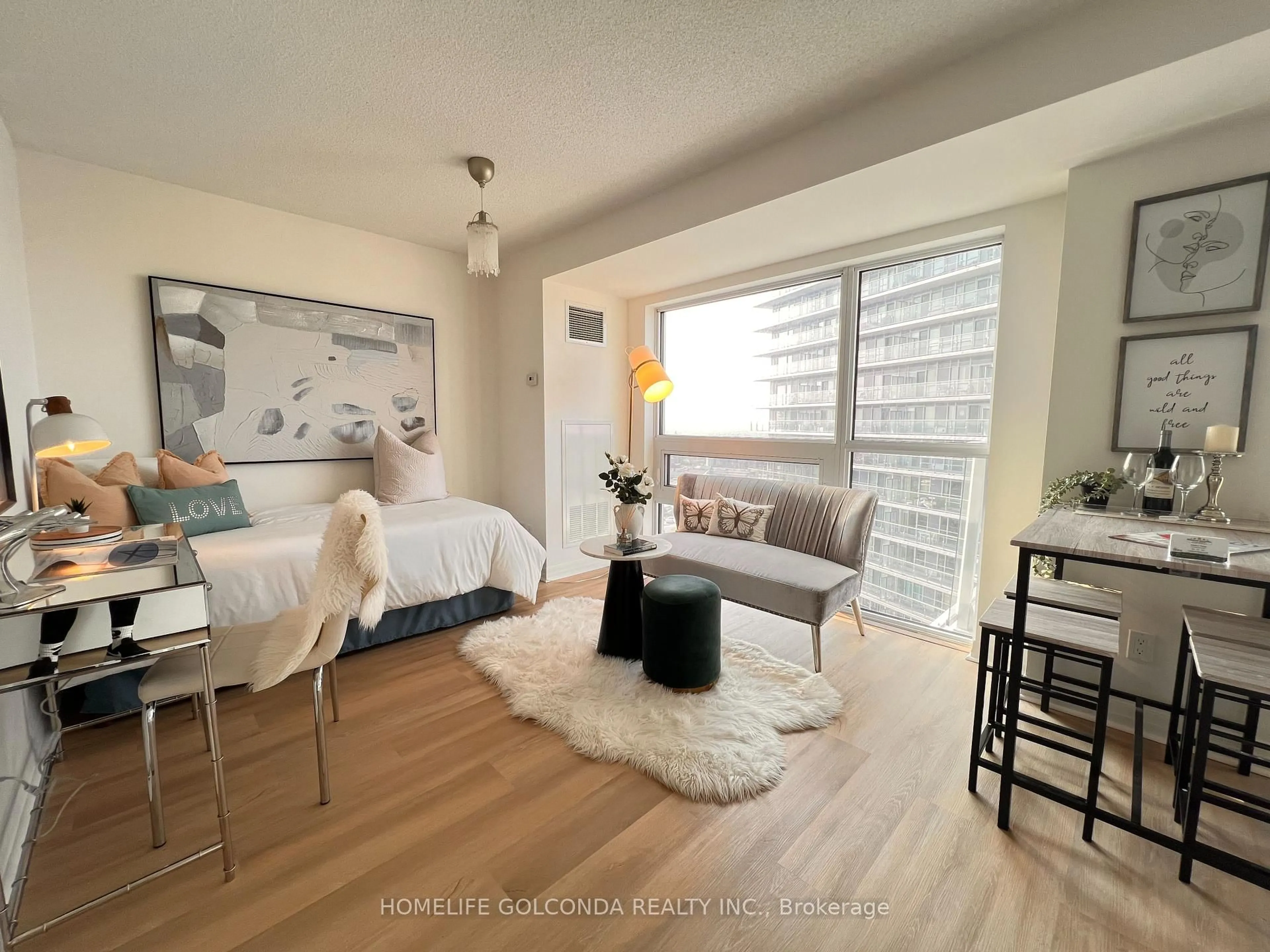 Living room with furniture, wood/laminate floor for 275 YORKLAND Rd #2903, Toronto Ontario M2J 0B4