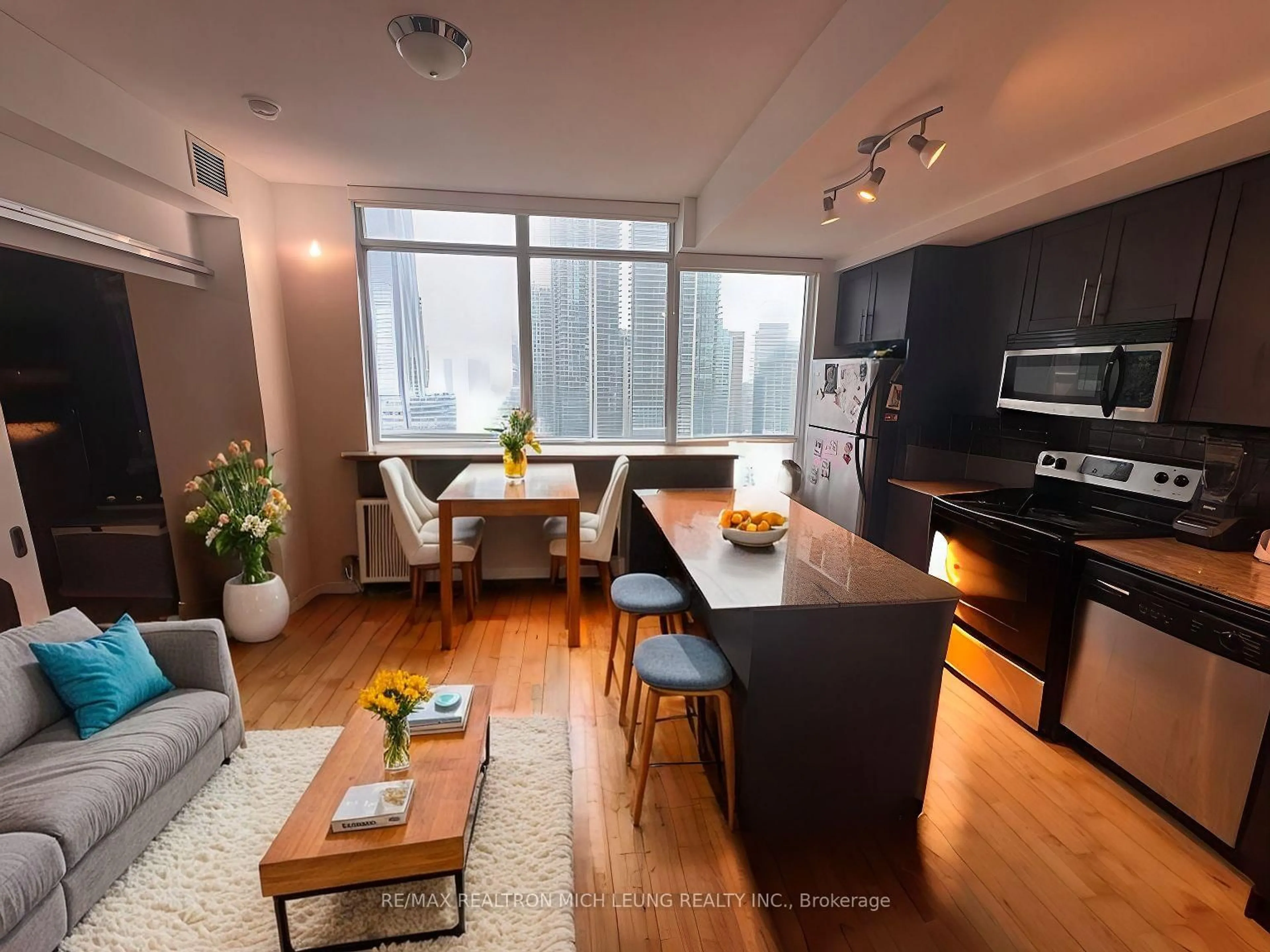 Open concept kitchen, wood/laminate floor for 55 Bremner Blvd #1704, Toronto Ontario M5J 0A6