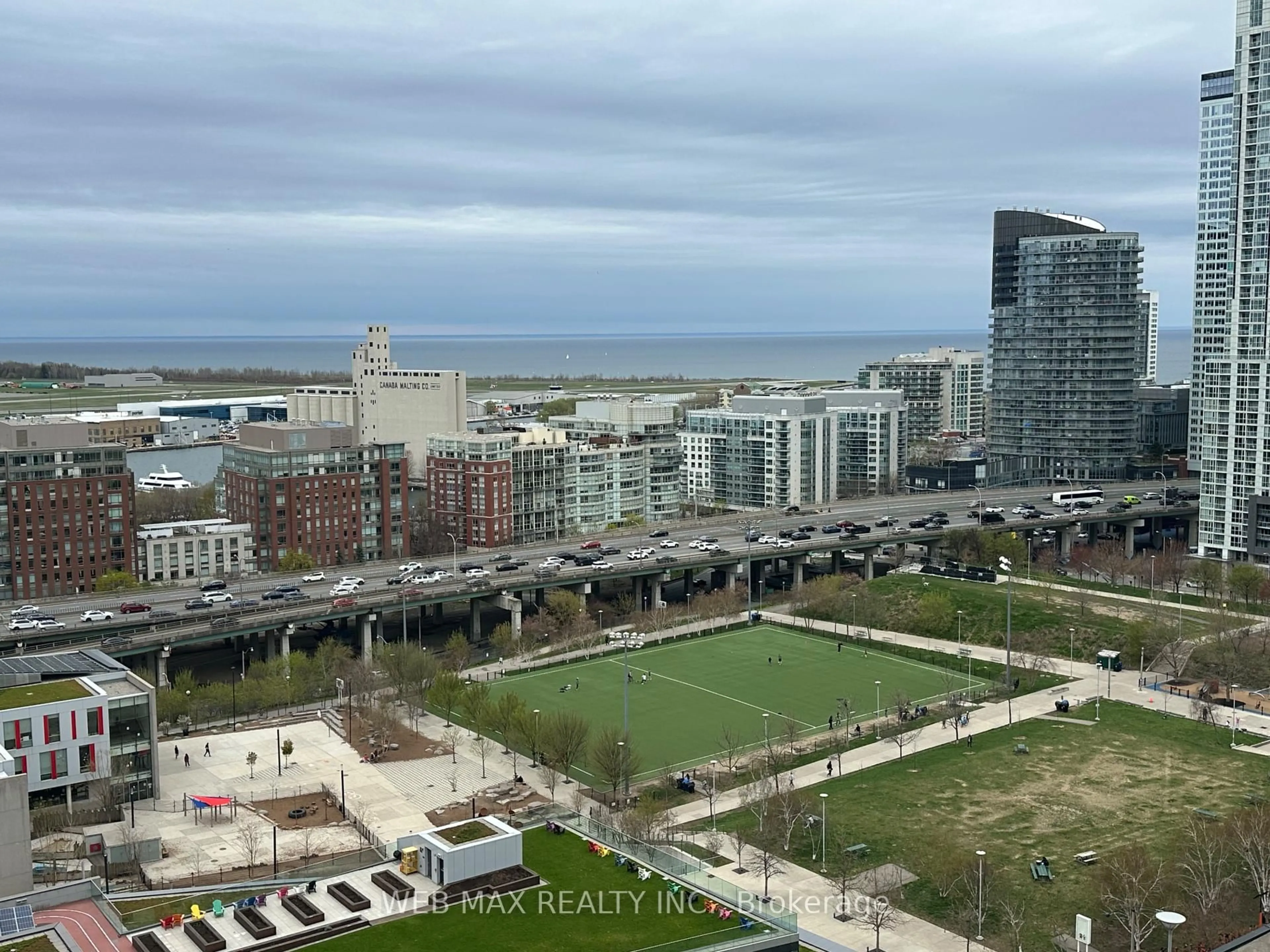 A pic from outside/outdoor area/front of a property/back of a property/a pic from drone, city buildings view from balcony for 8 Telegram Mews #2009, Toronto Ontario M5V 3Z5