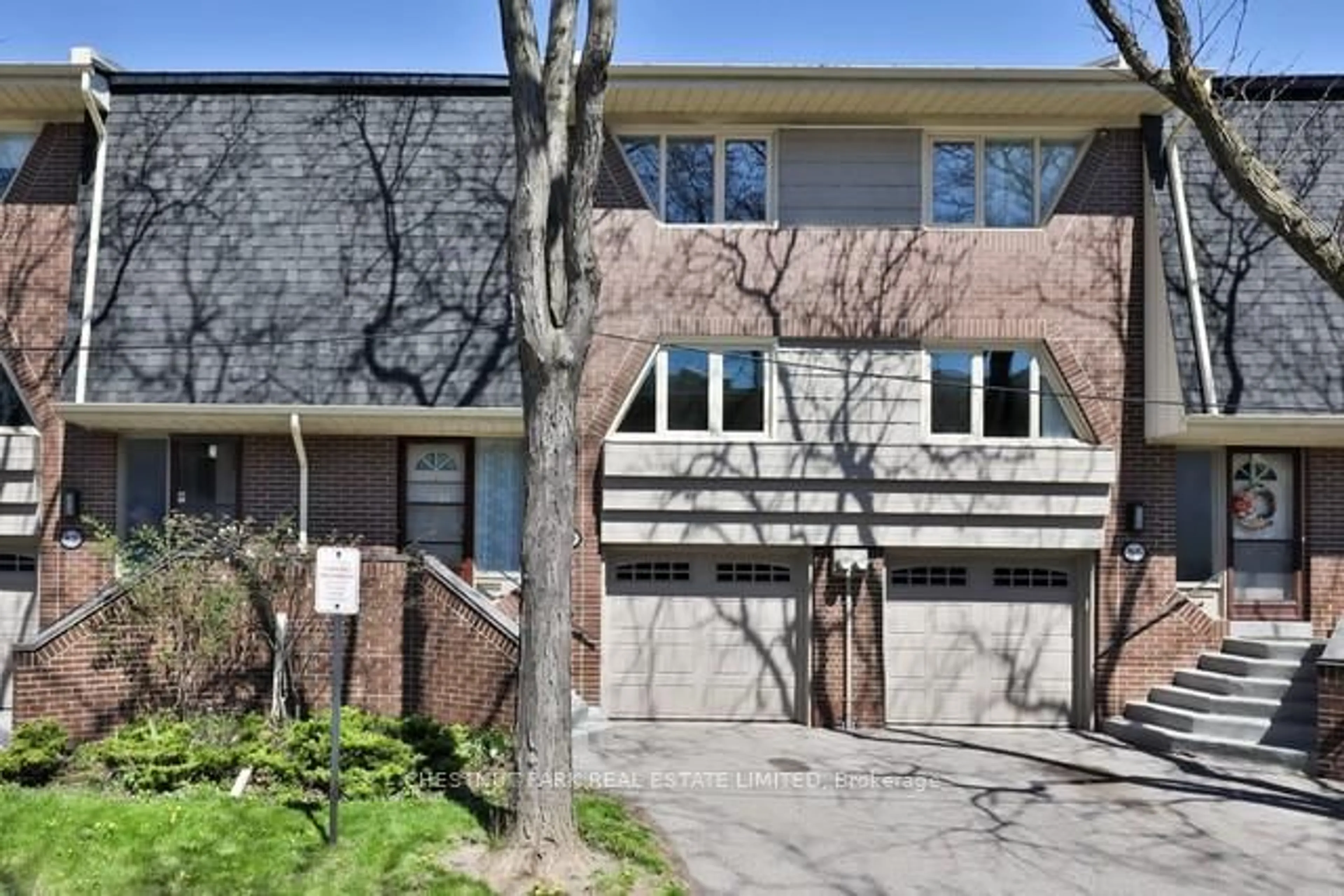Home with brick exterior material, street for 84 Flaming Roseway N/A, Toronto Ontario M5N 5W8
