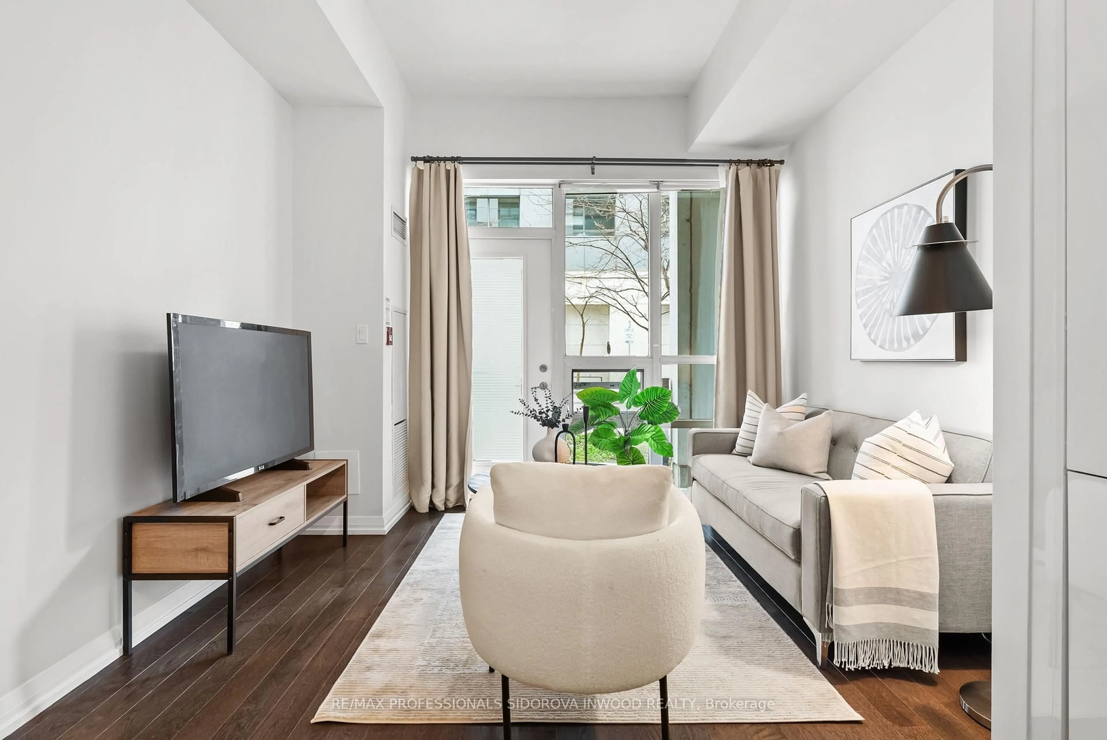 Living room with furniture, unknown for 460 Adelaide St #102, Toronto Ontario M5A 1N6