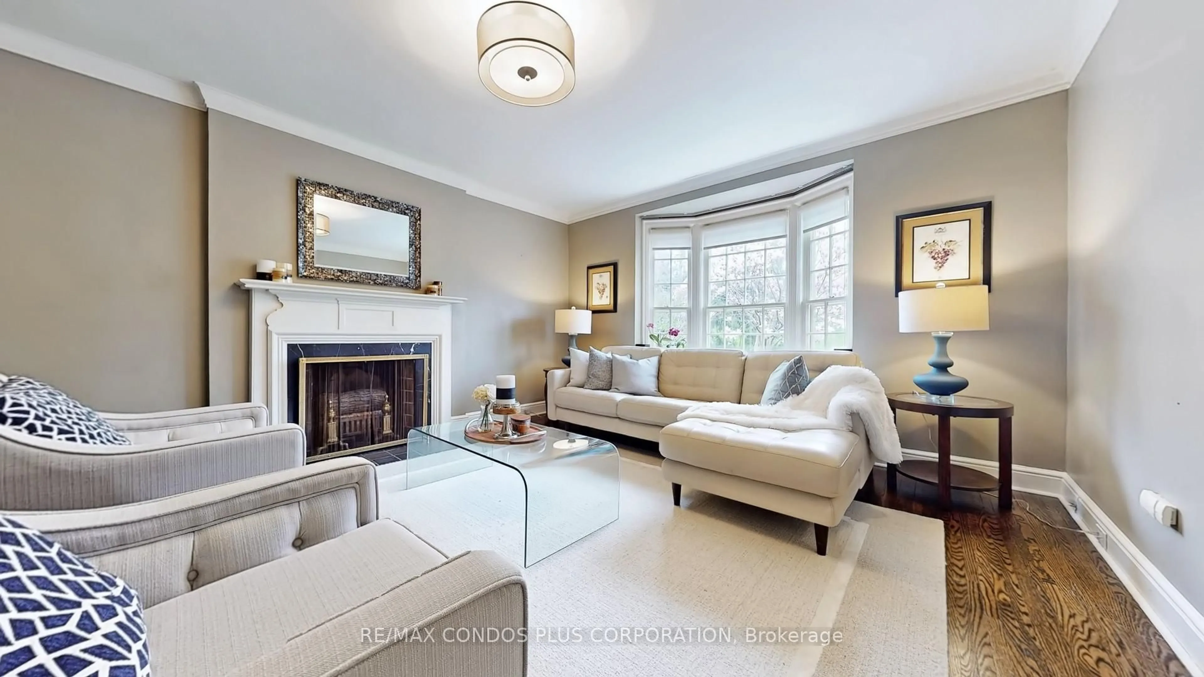 Living room with furniture, ceramic/tile floor for 28 Elmsthorpe Ave, Toronto Ontario M5P 2L6