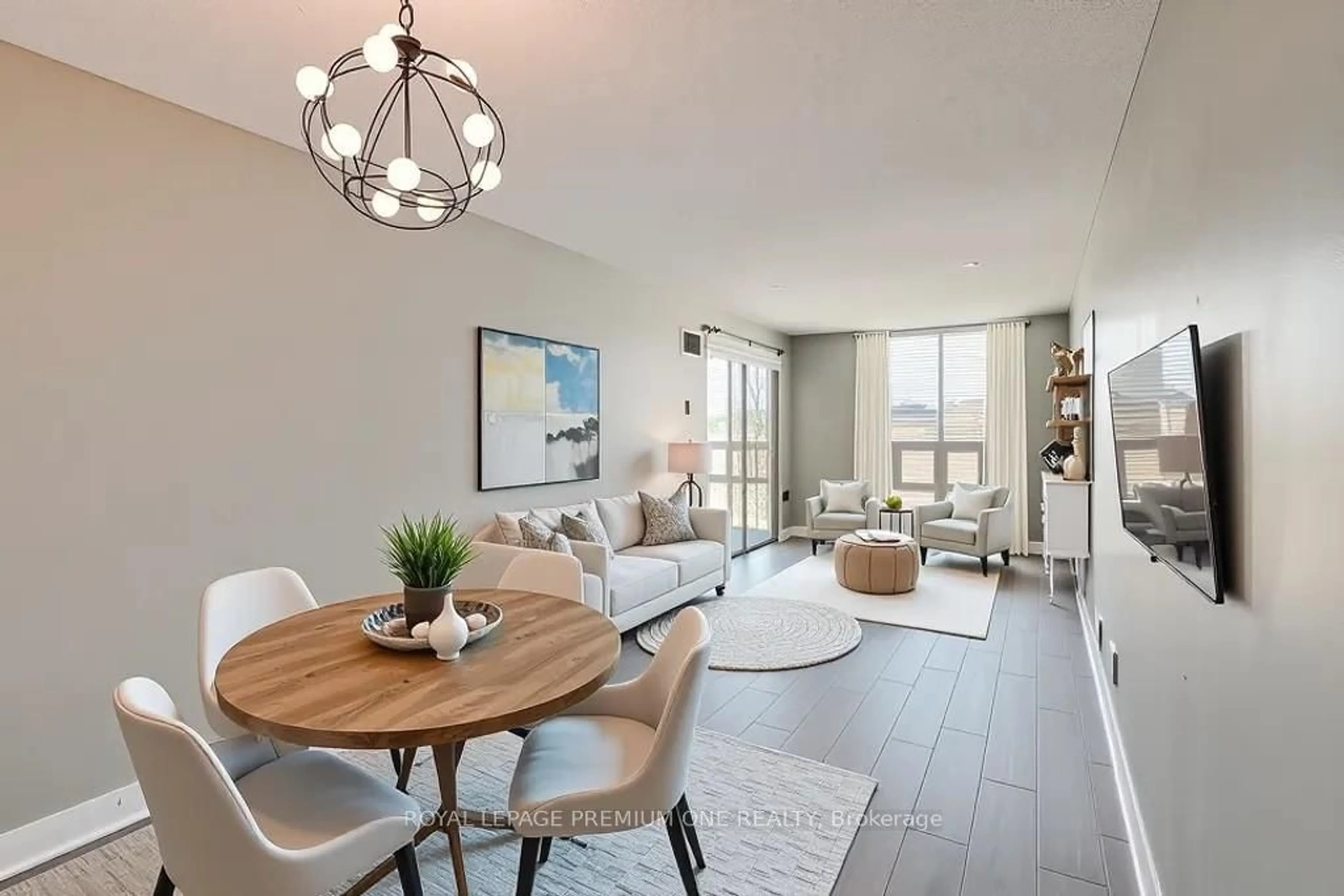 Living room with furniture, wood/laminate floor for 195 Wynford Dr #1008, Toronto Ontario M3C 3P3