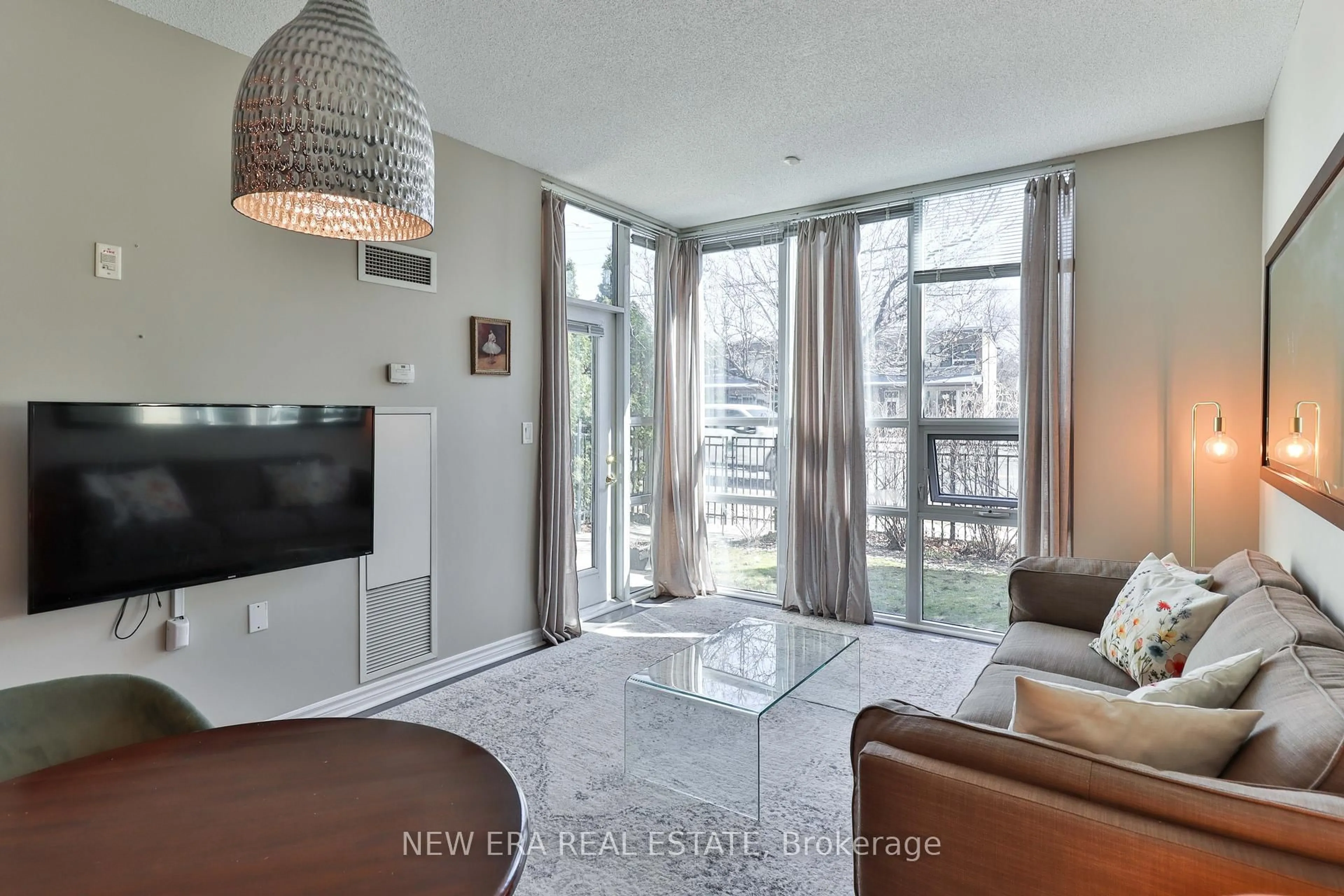 Living room with furniture, unknown for 3830 Bathurst St #108, Toronto Ontario M3H 6C5