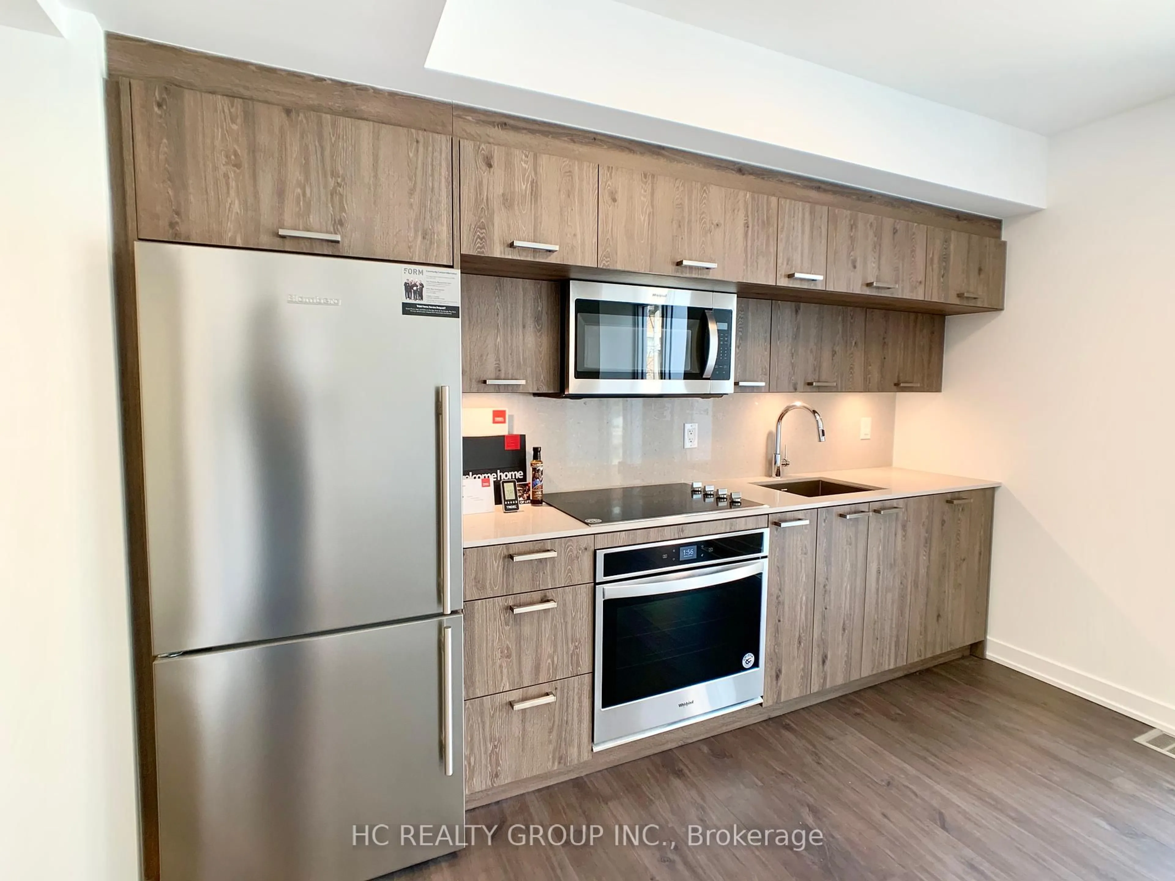 Standard kitchen, wood/laminate floor for 50 McCaul St #205, Toronto Ontario M5T 0B6