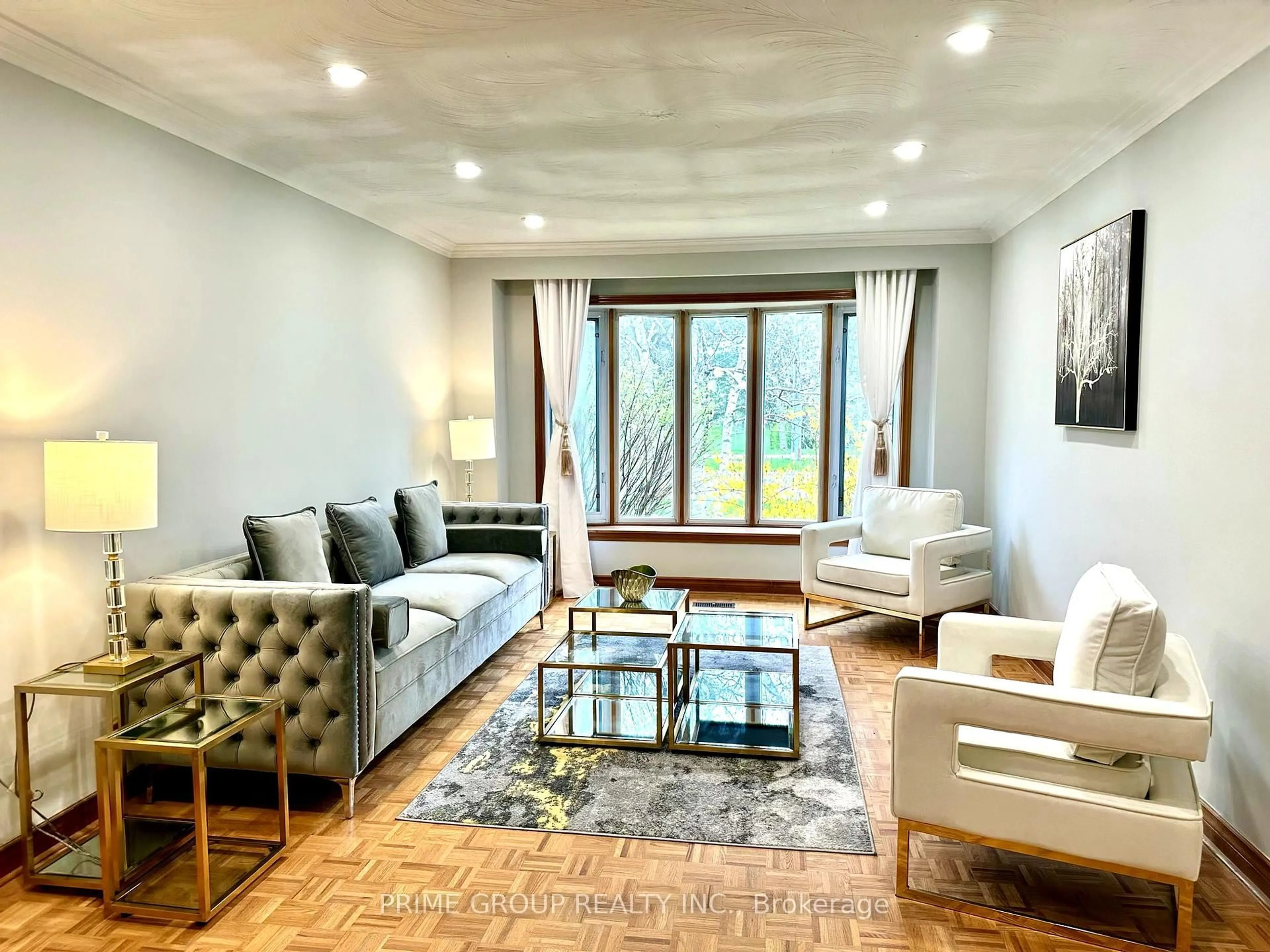 Living room with furniture, wood/laminate floor for 173 Faywood Blvd, Toronto Ontario M3H 2Y1