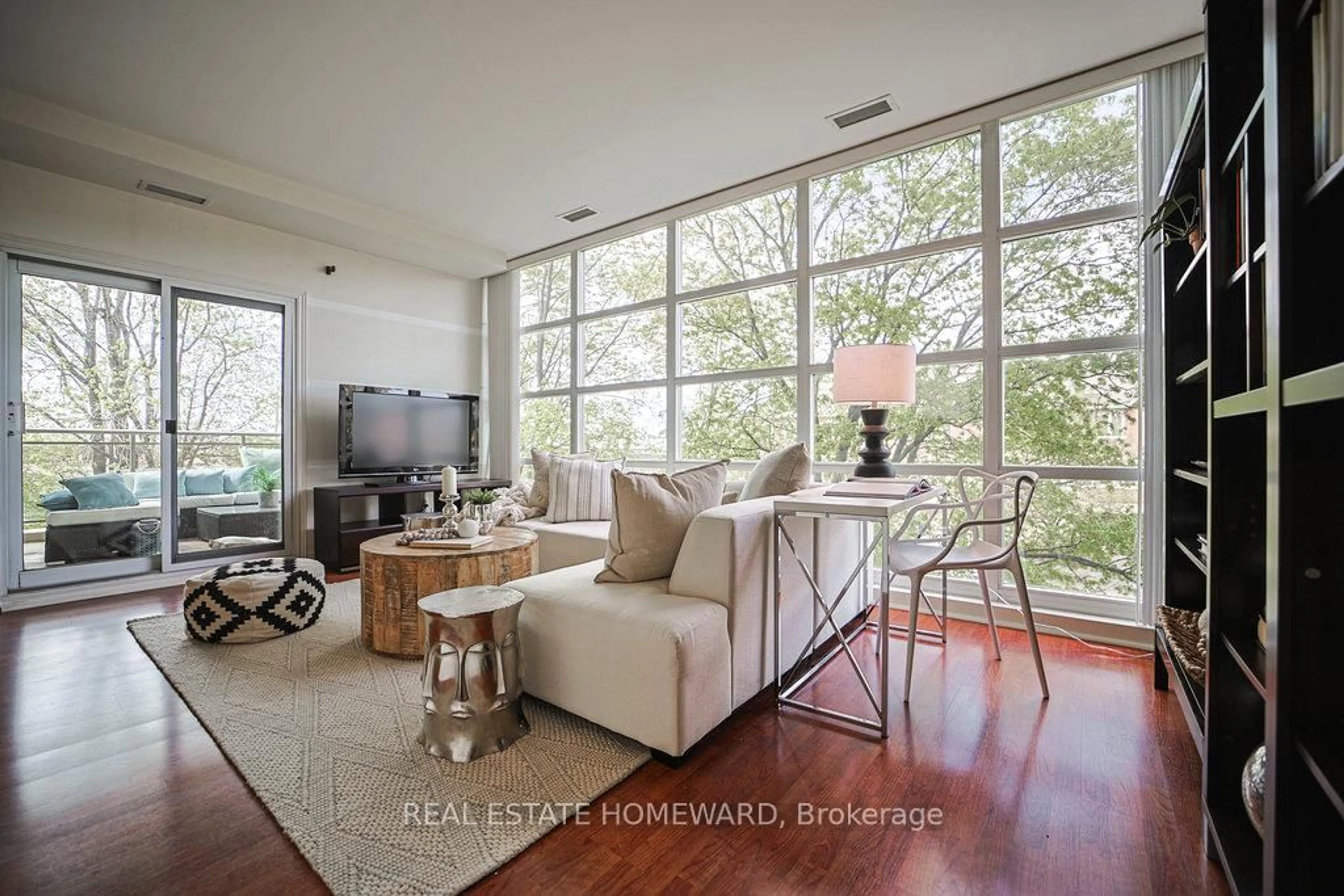 Living room with furniture, unknown for 1 Leaside Park Dr #209, Toronto Ontario M4H 1R1