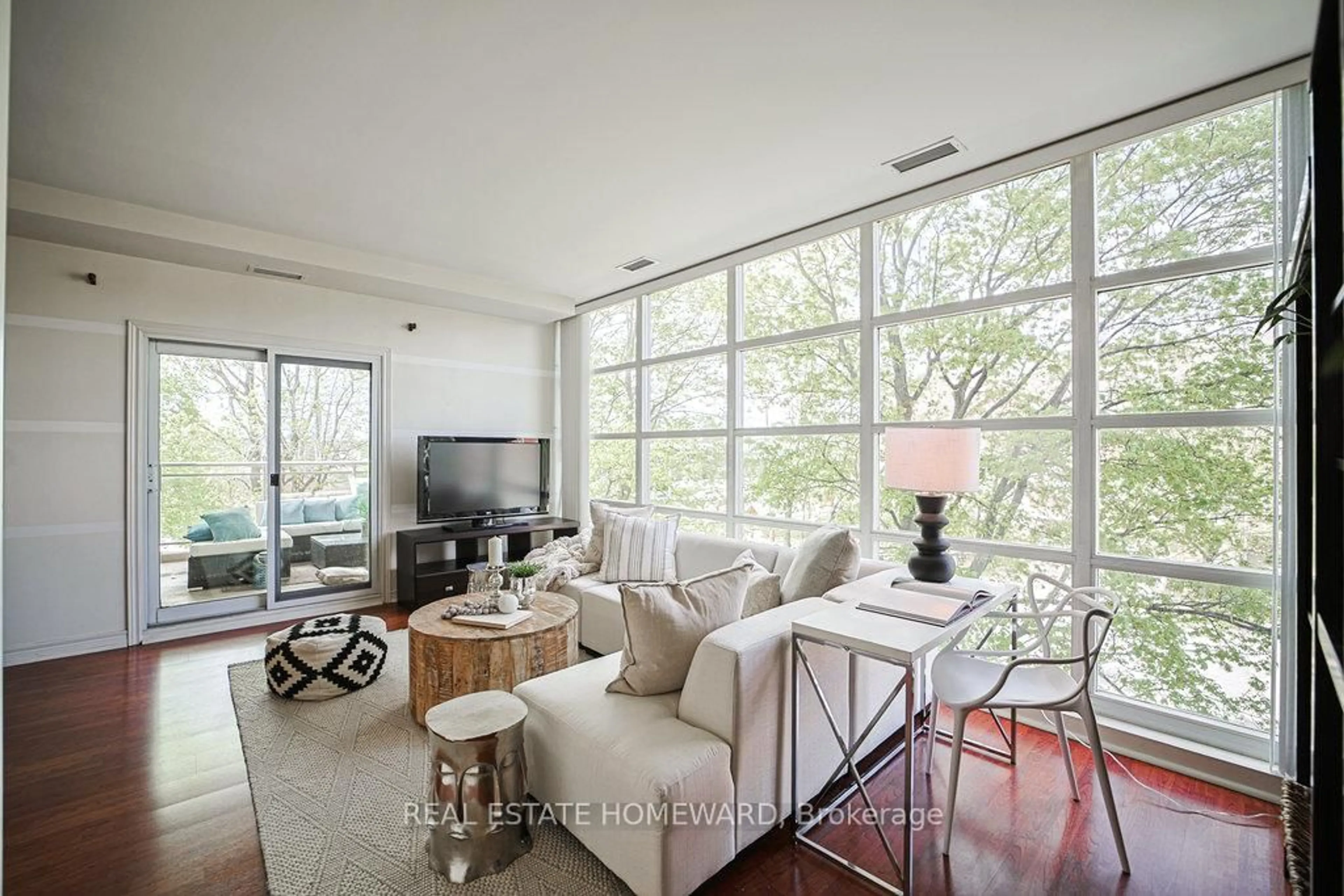 Living room with furniture, unknown for 1 Leaside Park Dr #209, Toronto Ontario M4H 1R1