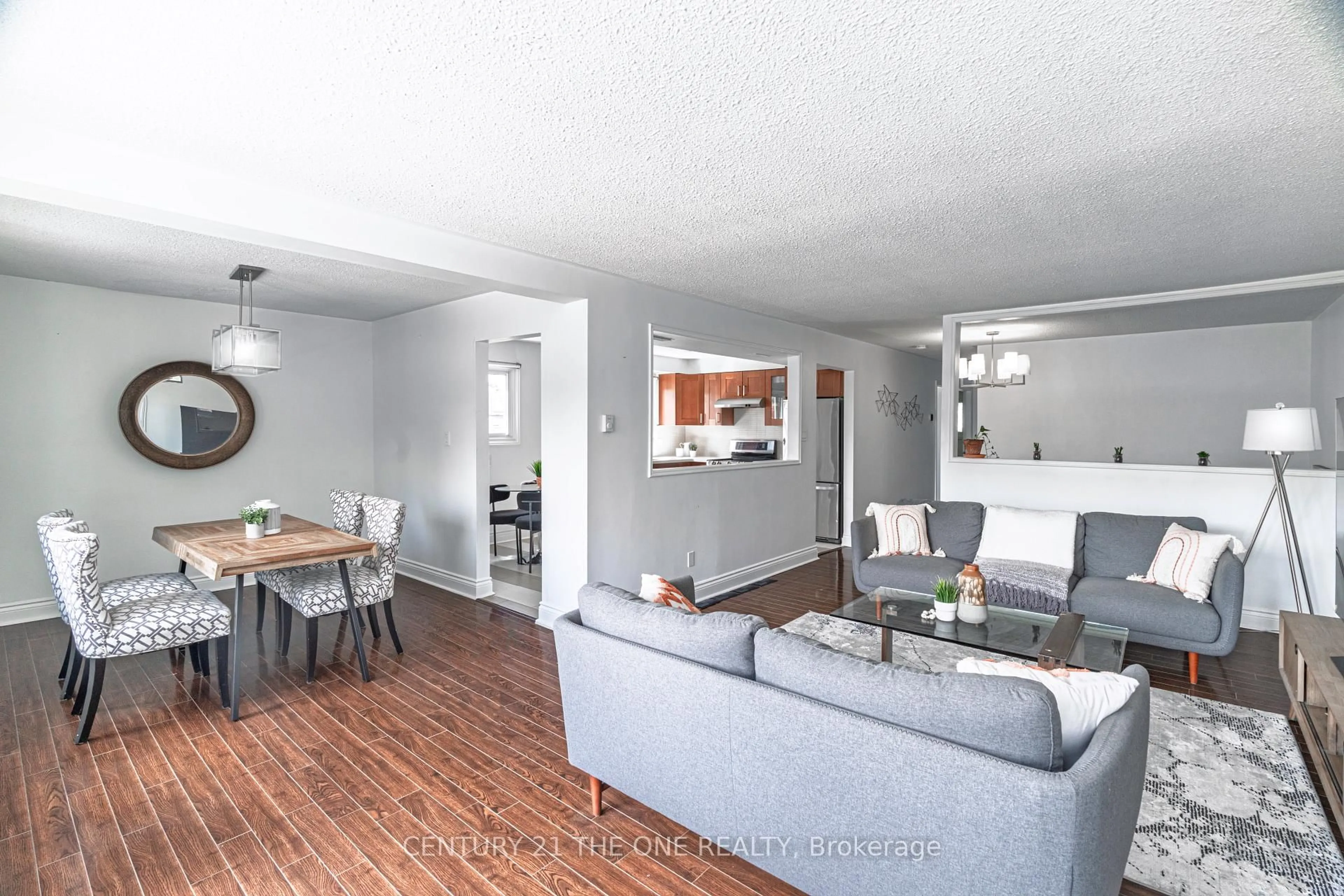 Living room with furniture, wood/laminate floor for 143 Silas Hill Dr, Toronto Ontario M2J 2X8