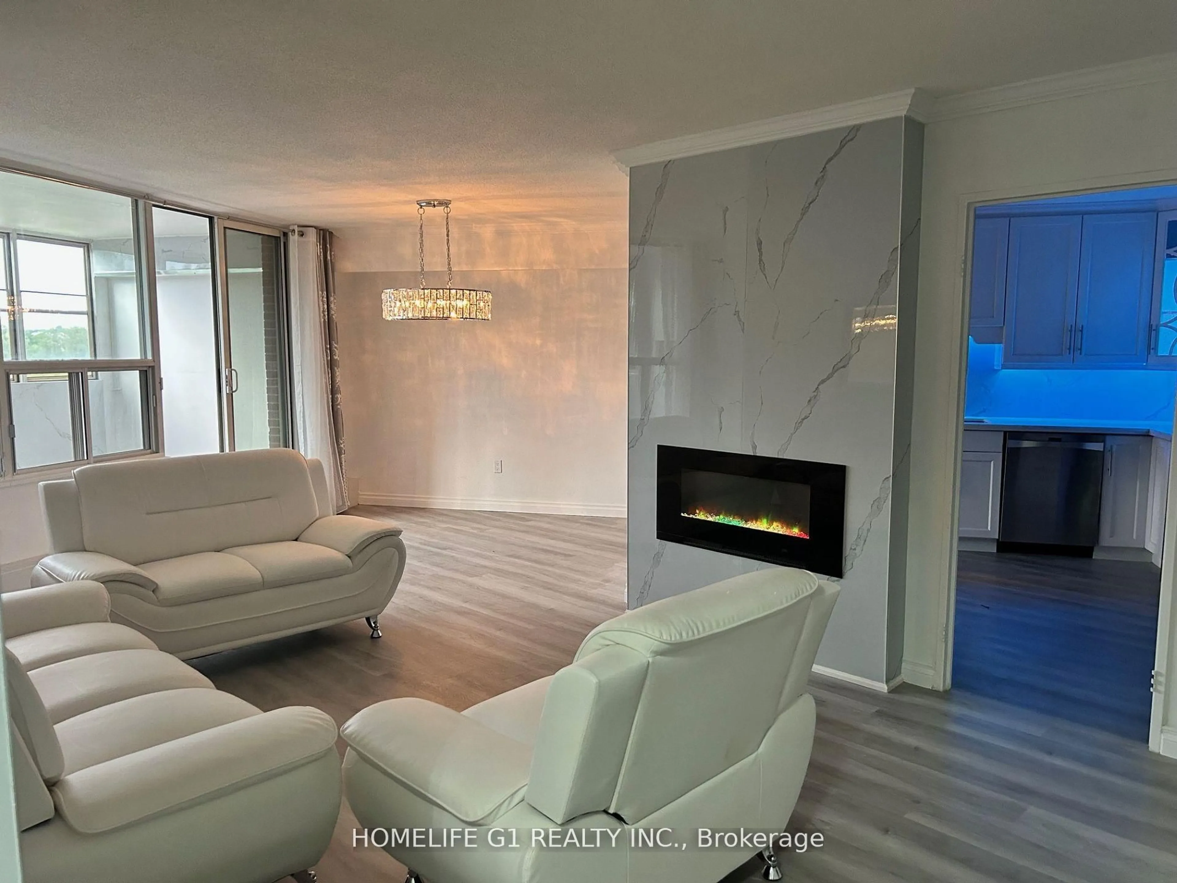 Living room with furniture, unknown for 60 Pavane Linkway N/A #203, Toronto Ontario M3C 1A1