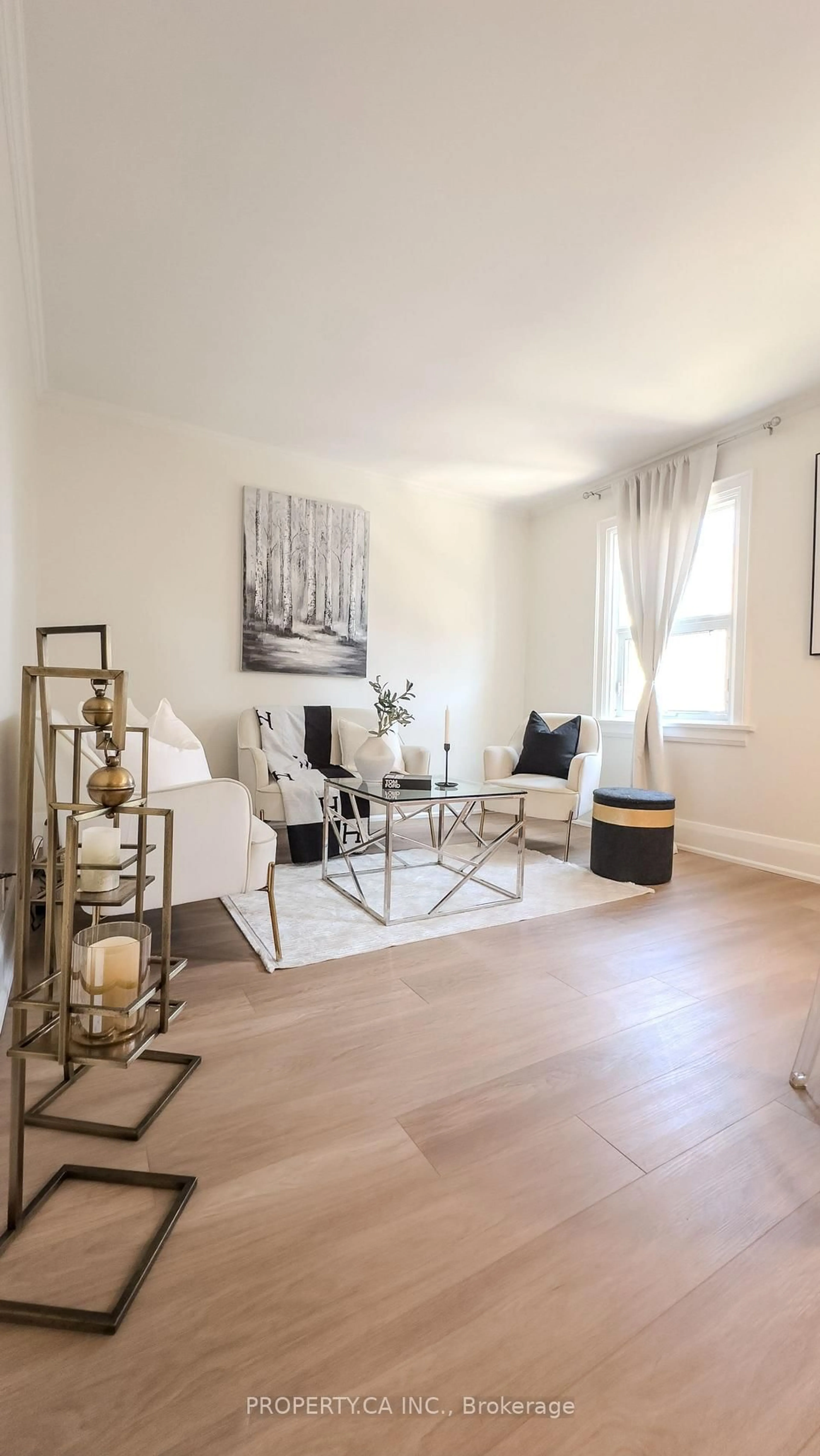 Living room with furniture, wood/laminate floor for 114 Vaughan Rd #402, Toronto Ontario M6C 2M1