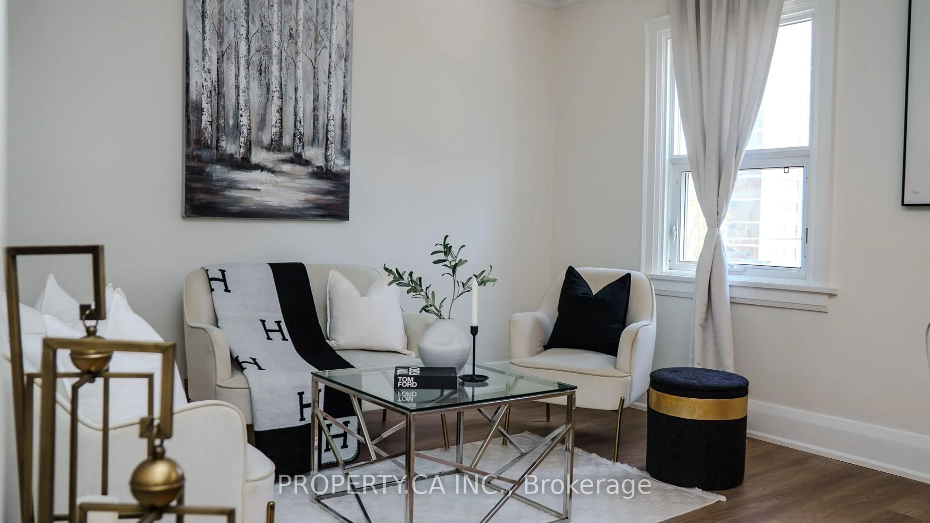 Living room with furniture, wood/laminate floor for 114 Vaughan Rd #402, Toronto Ontario M6C 2M1