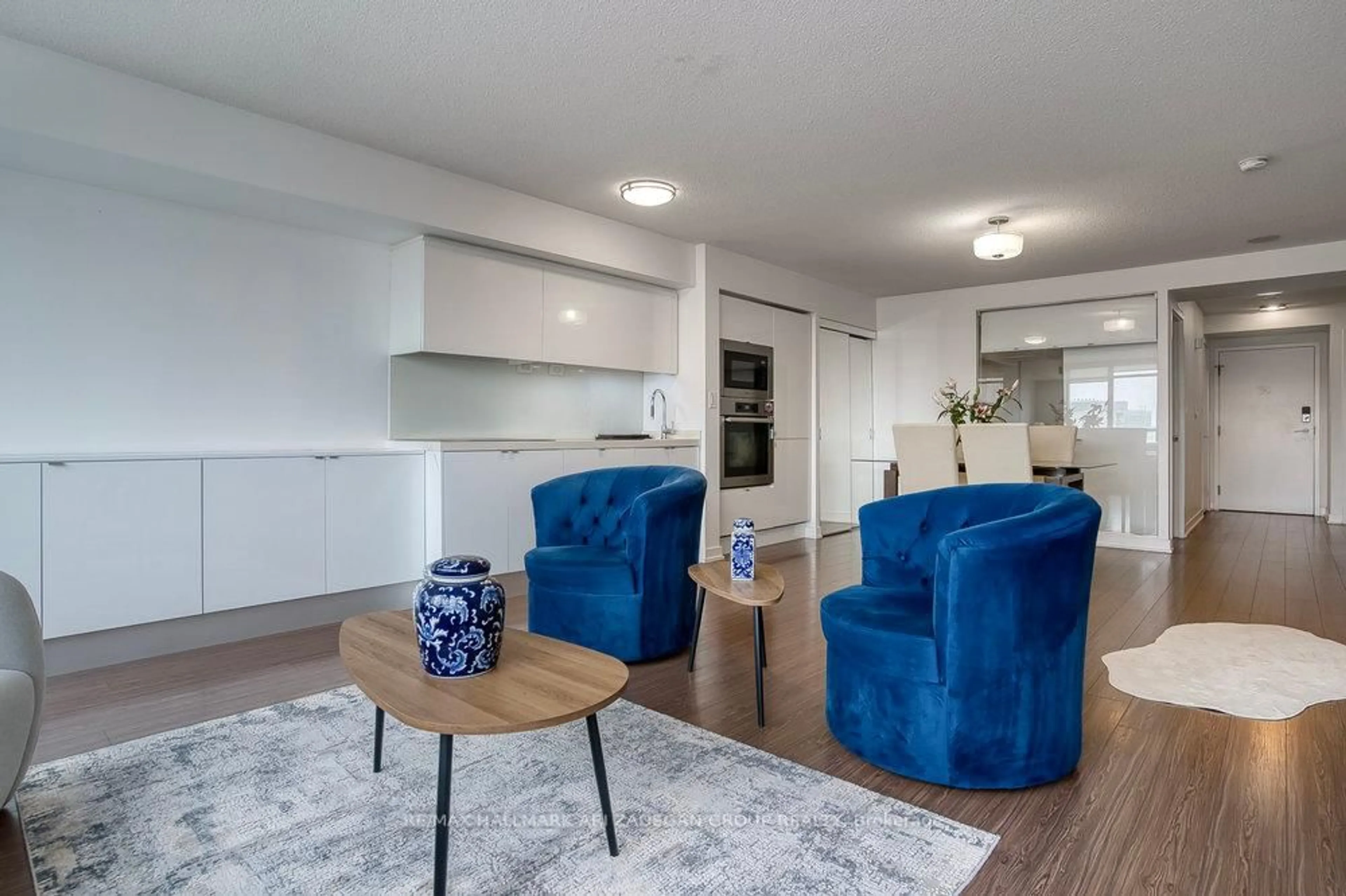 Living room with furniture, wood/laminate floor for 151 Dan Leckie Way #601, Toronto Ontario M5V 4B2
