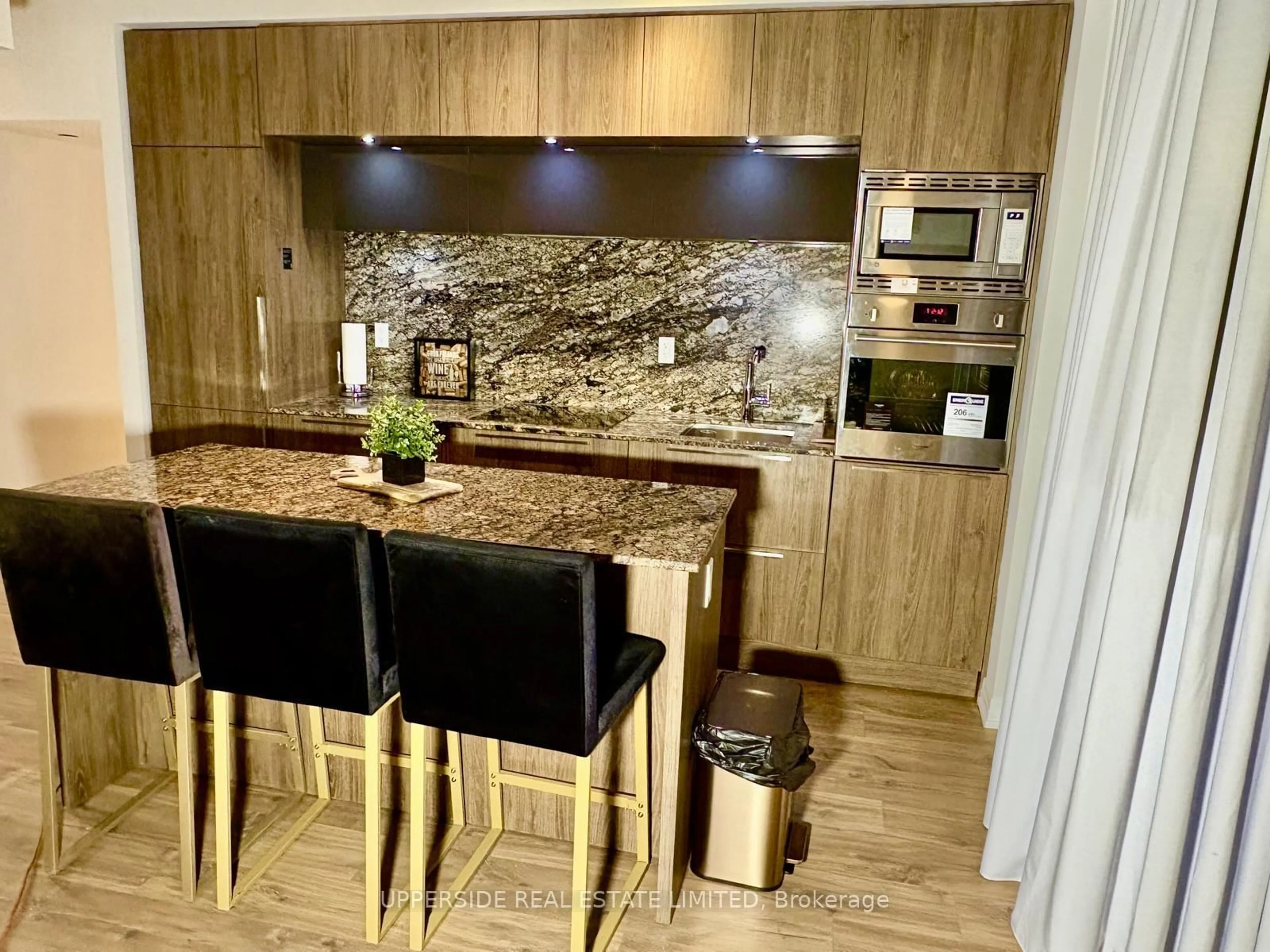 Contemporary kitchen, wood/laminate floor for 88 Blue Jays Way #1707, Toronto Ontario M5V 0L7