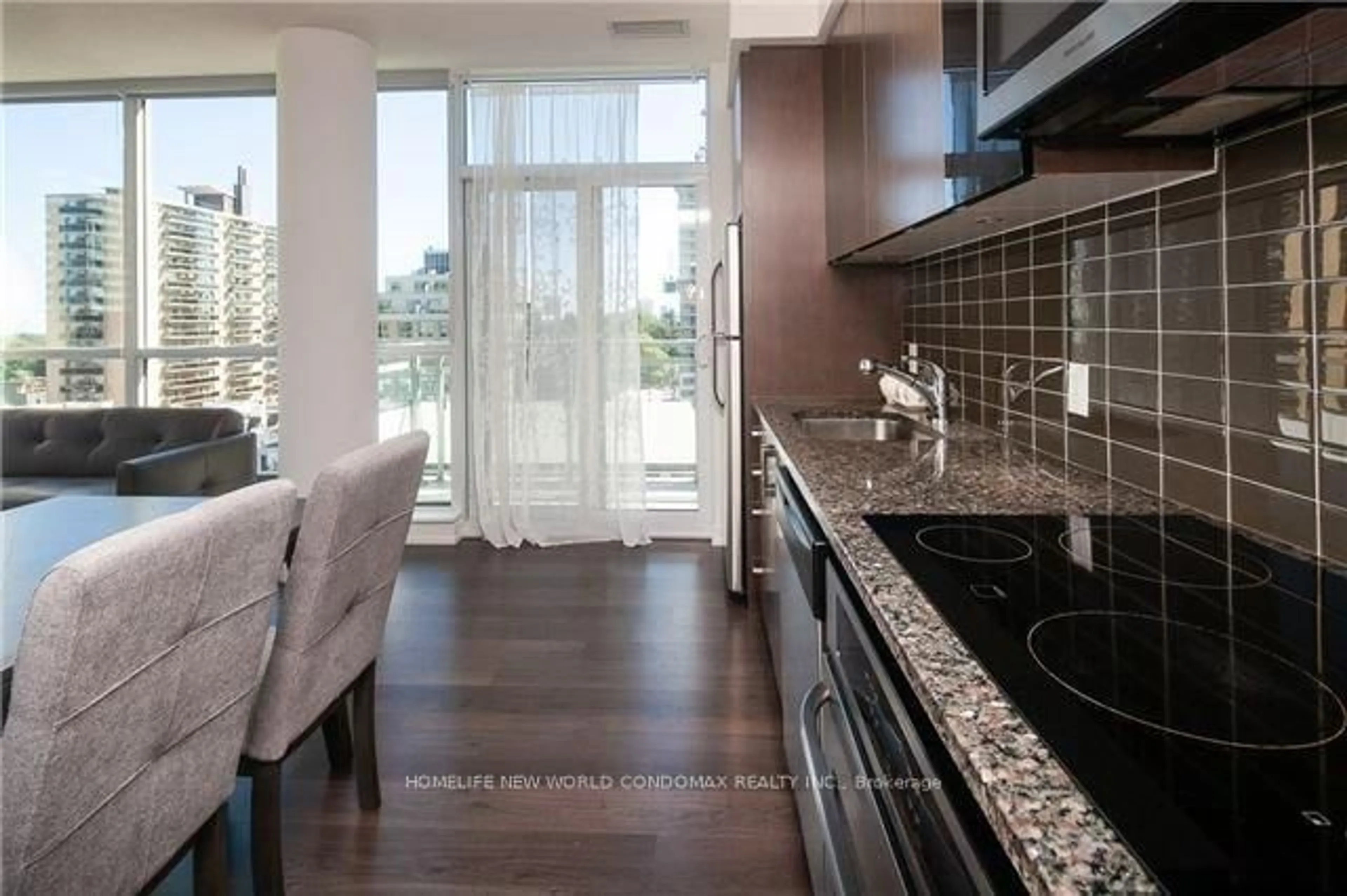 Open concept kitchen, ceramic/tile floor for 98 Lillian St #719, Toronto Ontario M4S 0A5