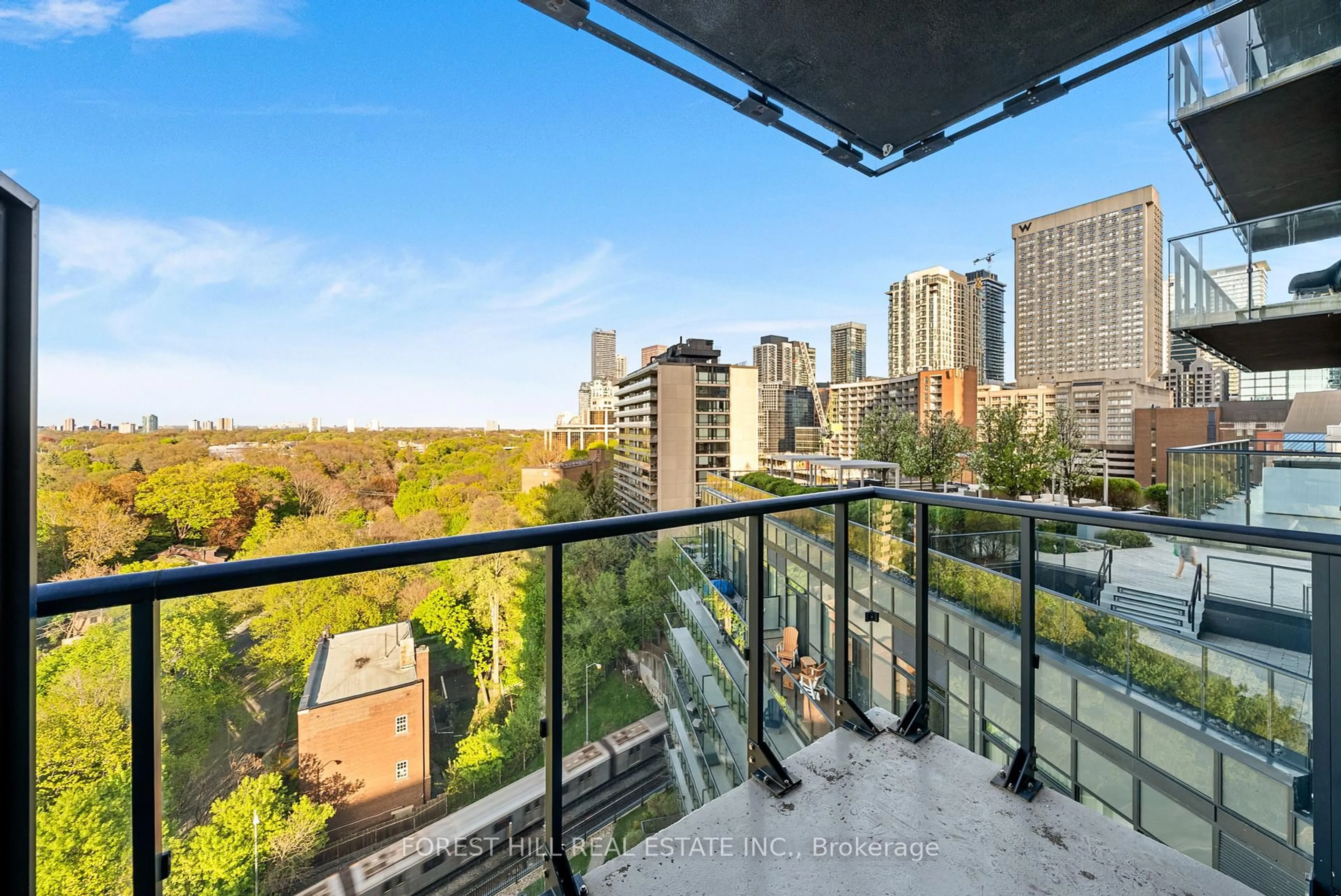 Balcony in the apartment, city buildings view from balcony for 825 Church St #1106, Toronto Ontario M4W 3Z4
