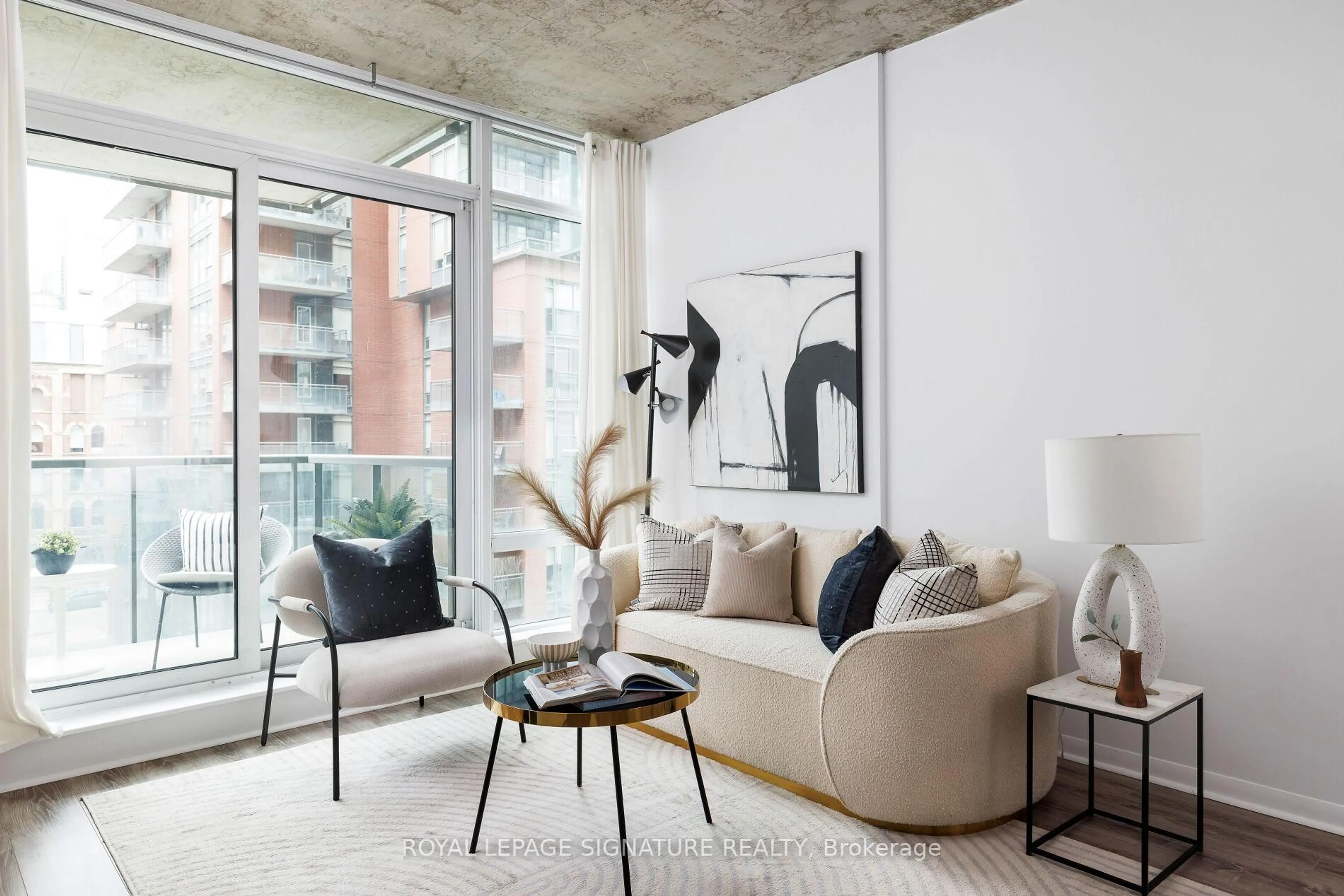 Living room with furniture, cement floor for 333 ADELAIDE St #534, Toronto Ontario M5A 4T4