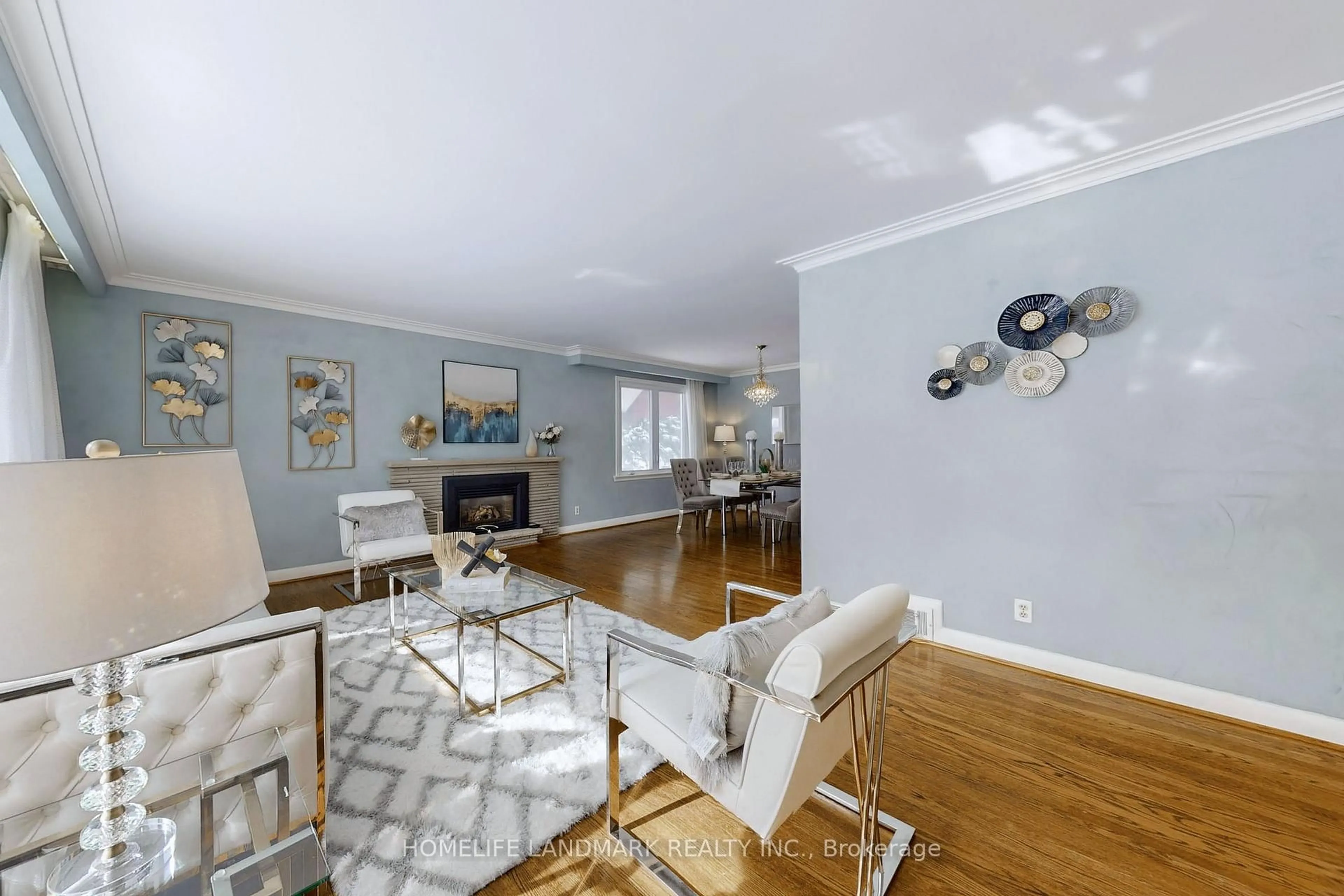 Living room with furniture, wood/laminate floor for 6 Morewood Cres, Toronto Ontario M2K 1L7