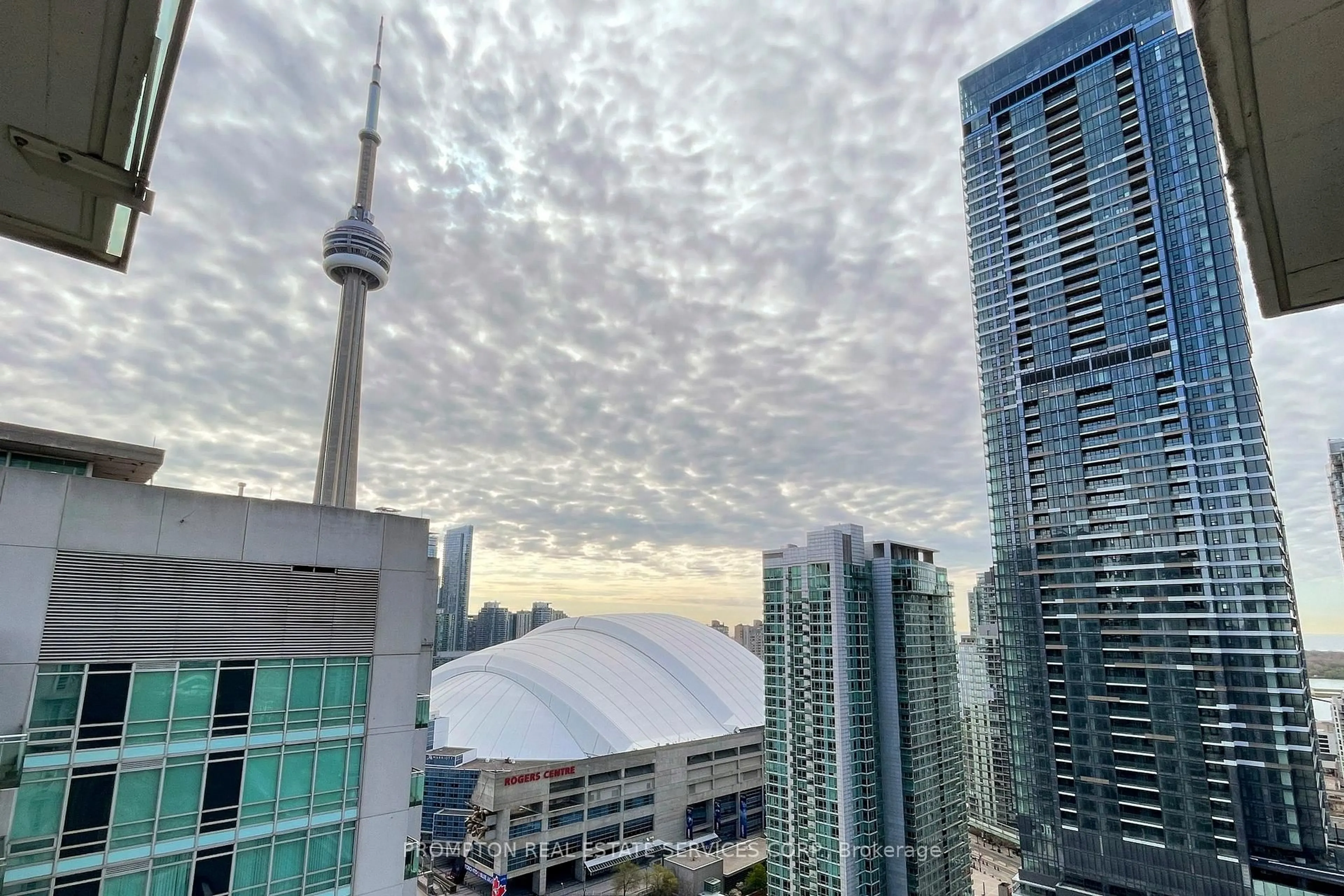 A pic from outside/outdoor area/front of a property/back of a property/a pic from drone, city buildings view from balcony for 397 FRONT St #3310, Toronto Ontario M5V 3S1