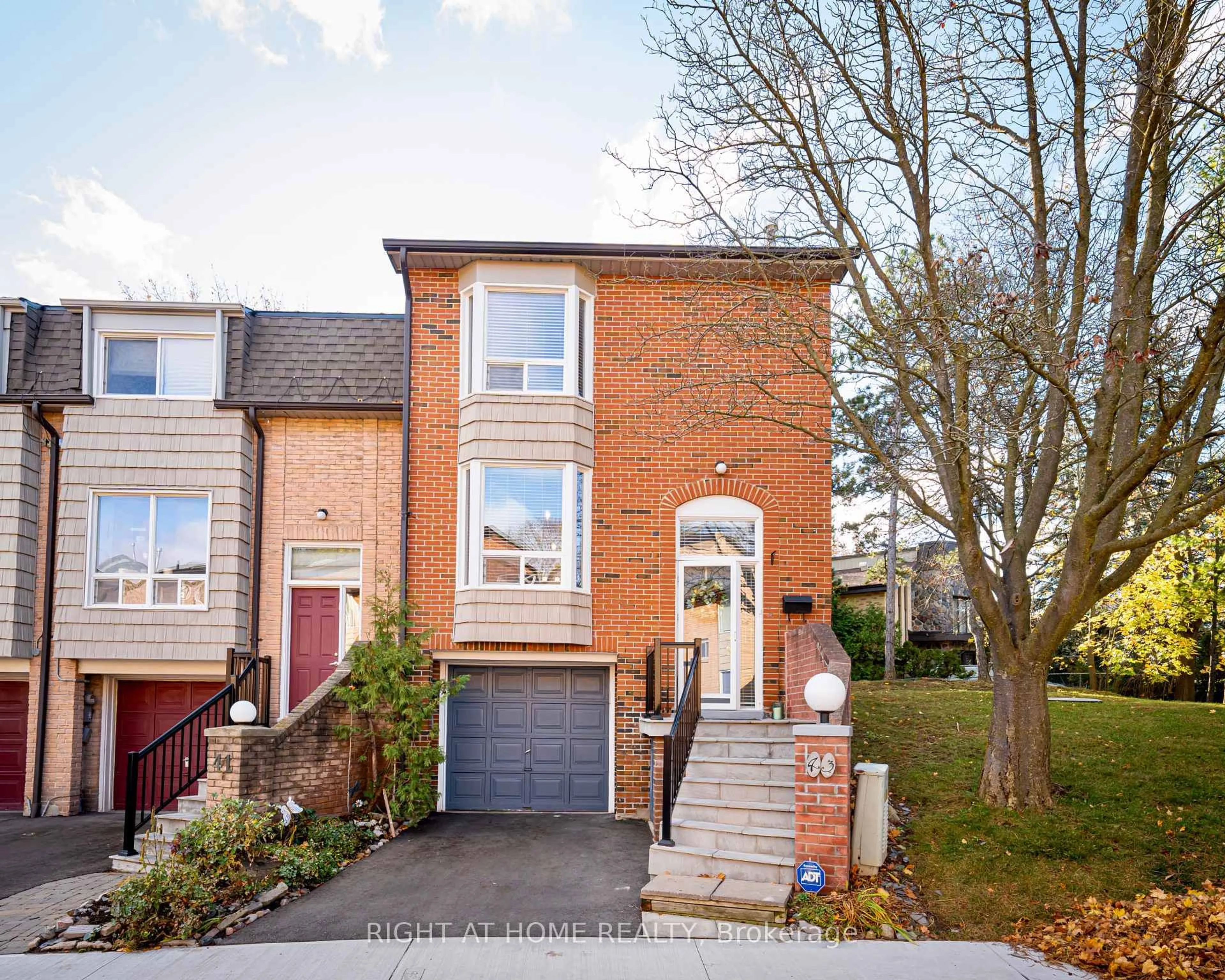 Home with brick exterior material, street for 43 Wild Ginger Way, Toronto Ontario M3H 5W9