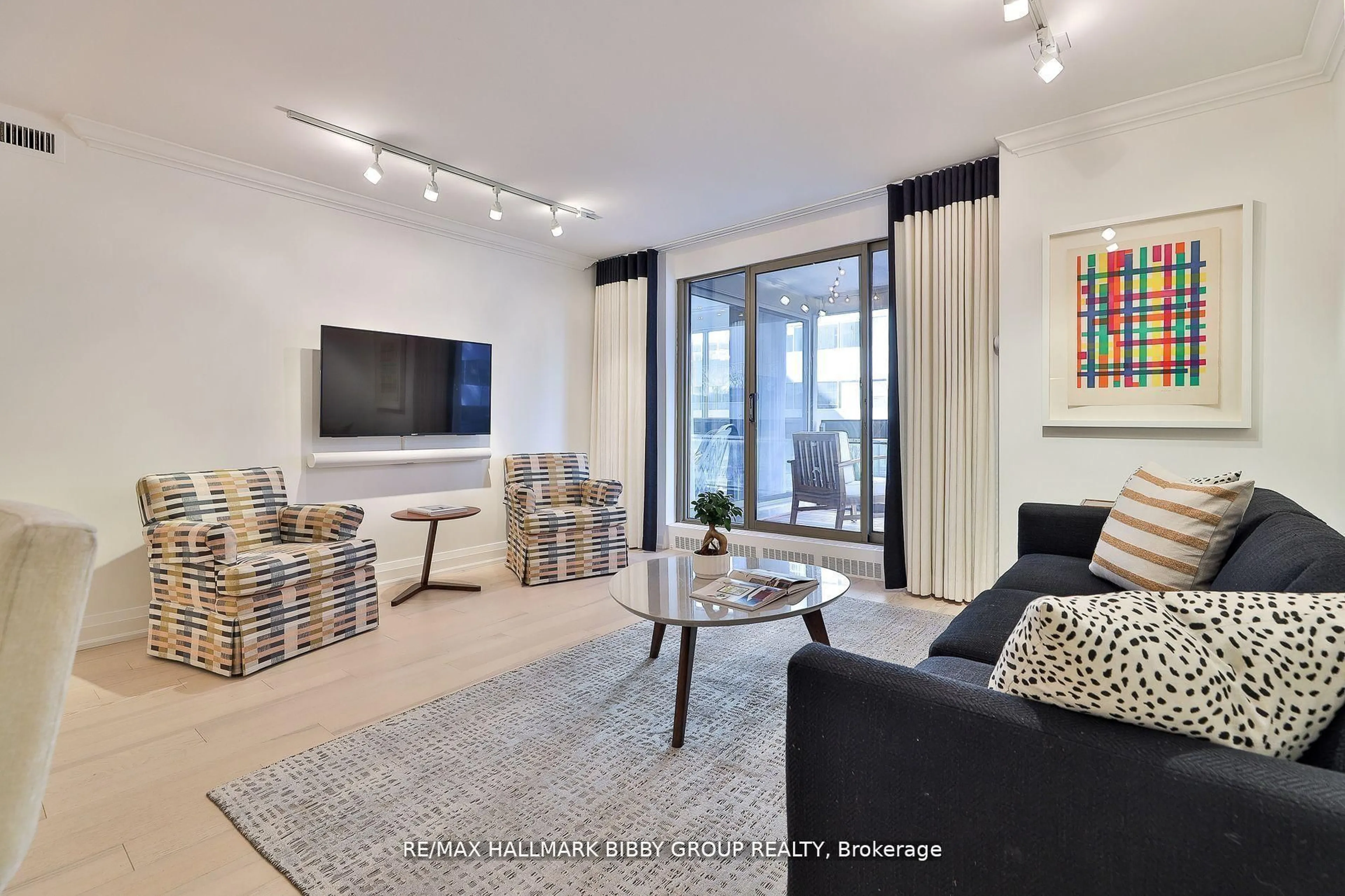 Living room with furniture, unknown for 61 St Clair Ave #206, Toronto Ontario M4V 2Y8