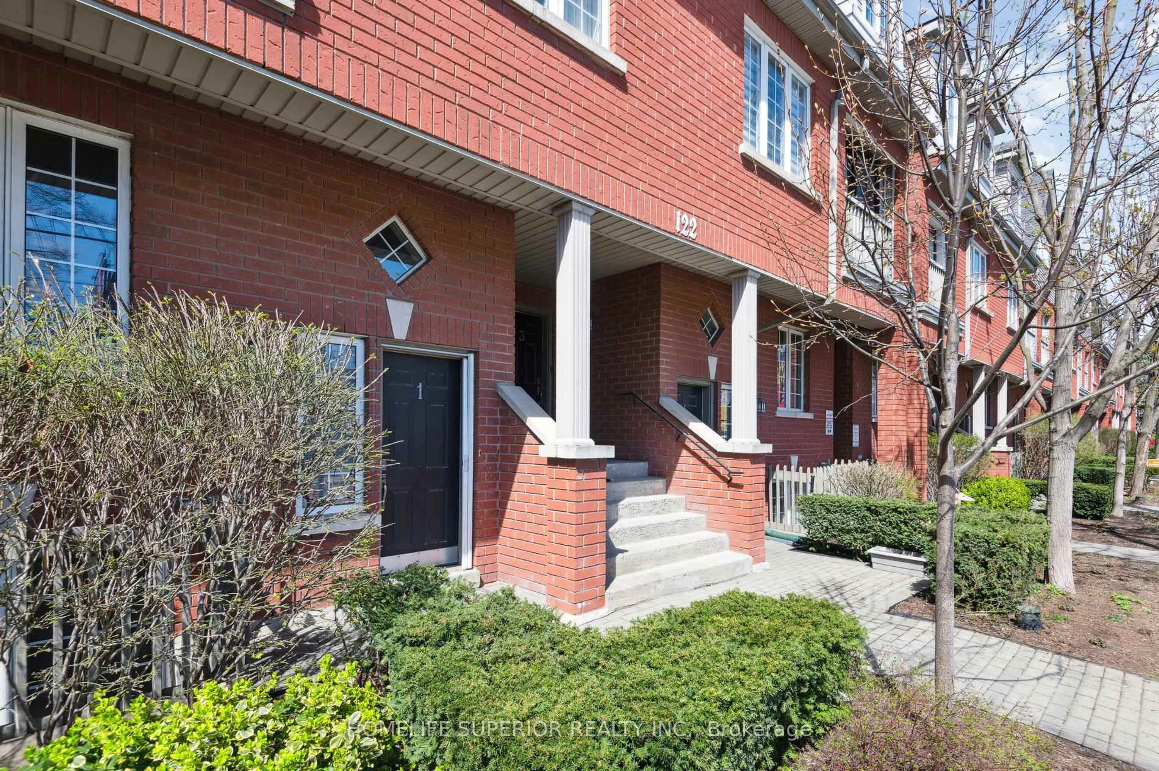 Home with brick exterior material, street for 122 Strachan Ave #1, Toronto Ontario M6J 3W4