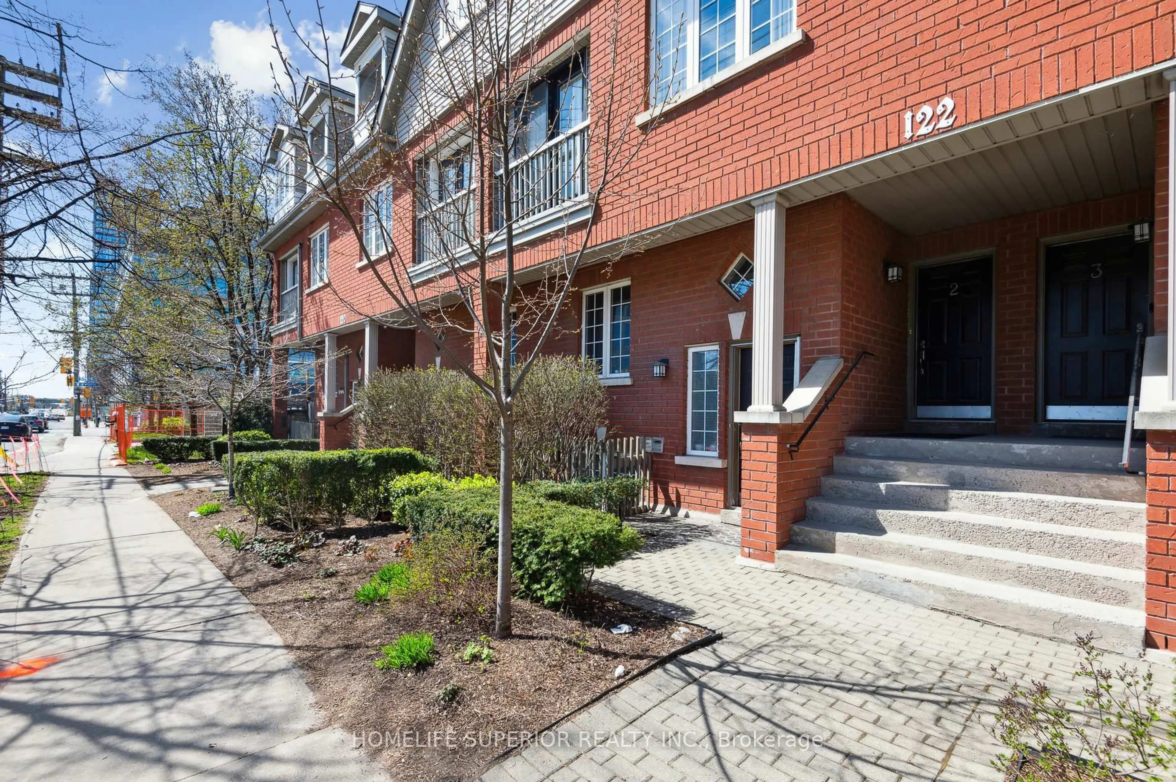 Home with brick exterior material, street for 122 Strachan Ave #1, Toronto Ontario M6J 3W4