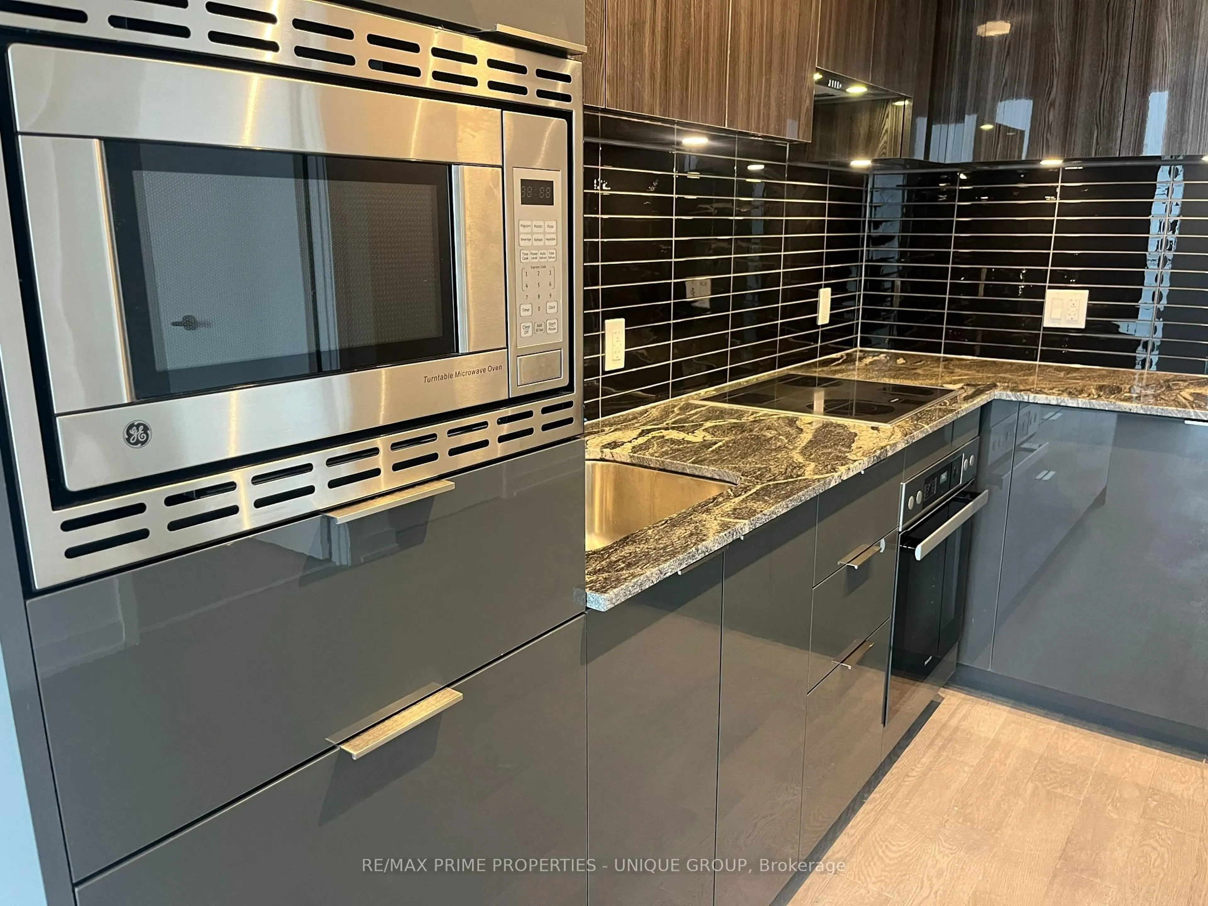 Contemporary kitchen, ceramic/tile floor for 50 O'Neill Rd #3103, Toronto Ontario M3C 0R1
