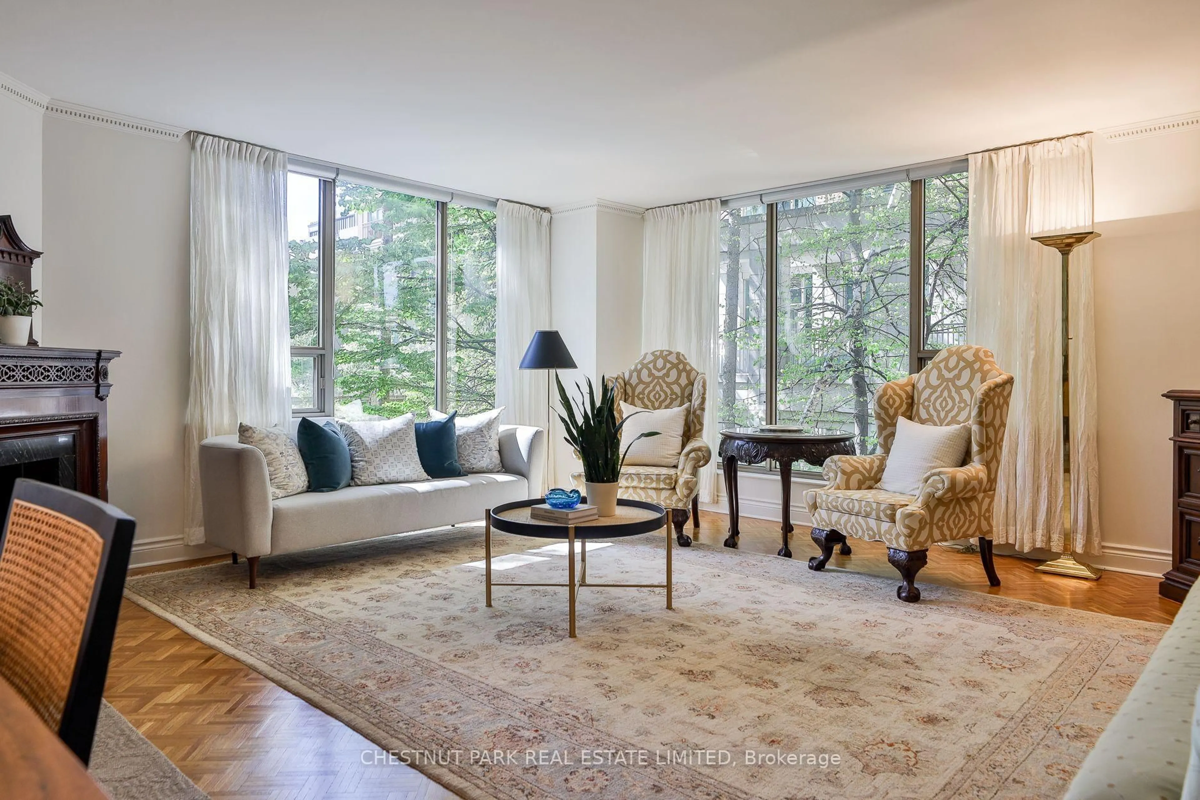 Living room with furniture, carpet floor for 2 Lynwood Ave #201, Toronto Ontario M4V 1K2